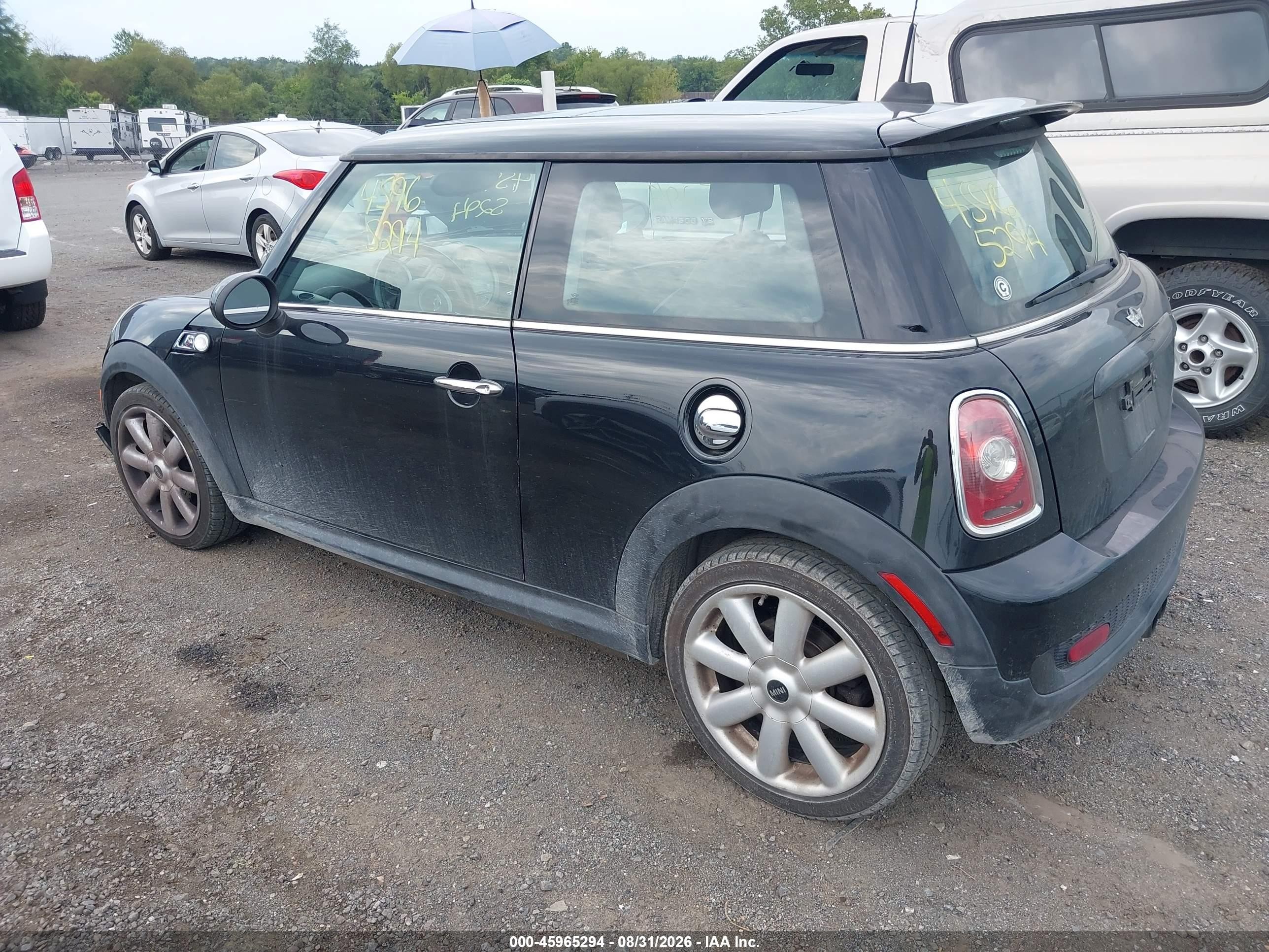 2009 Mini Cooper S   Black vin: WMWMF73539TT98409