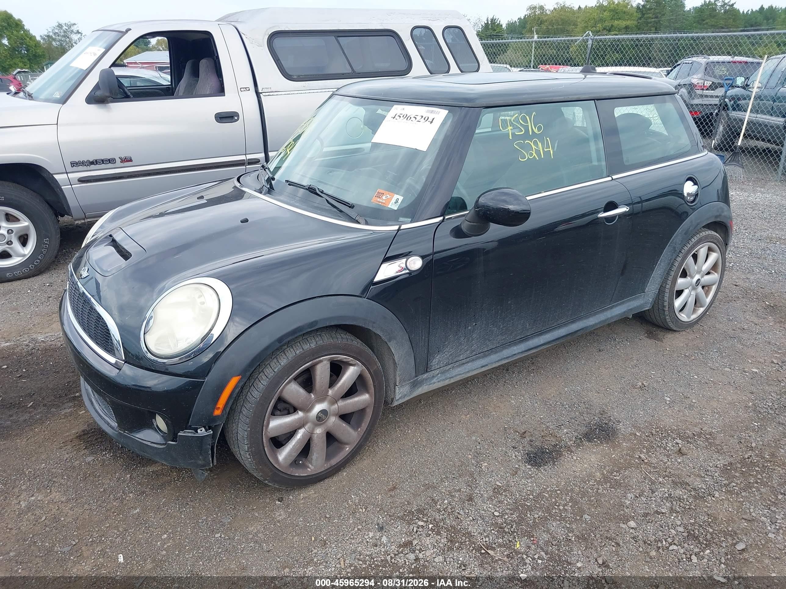 2009 Mini Cooper S   Black vin: WMWMF73539TT98409