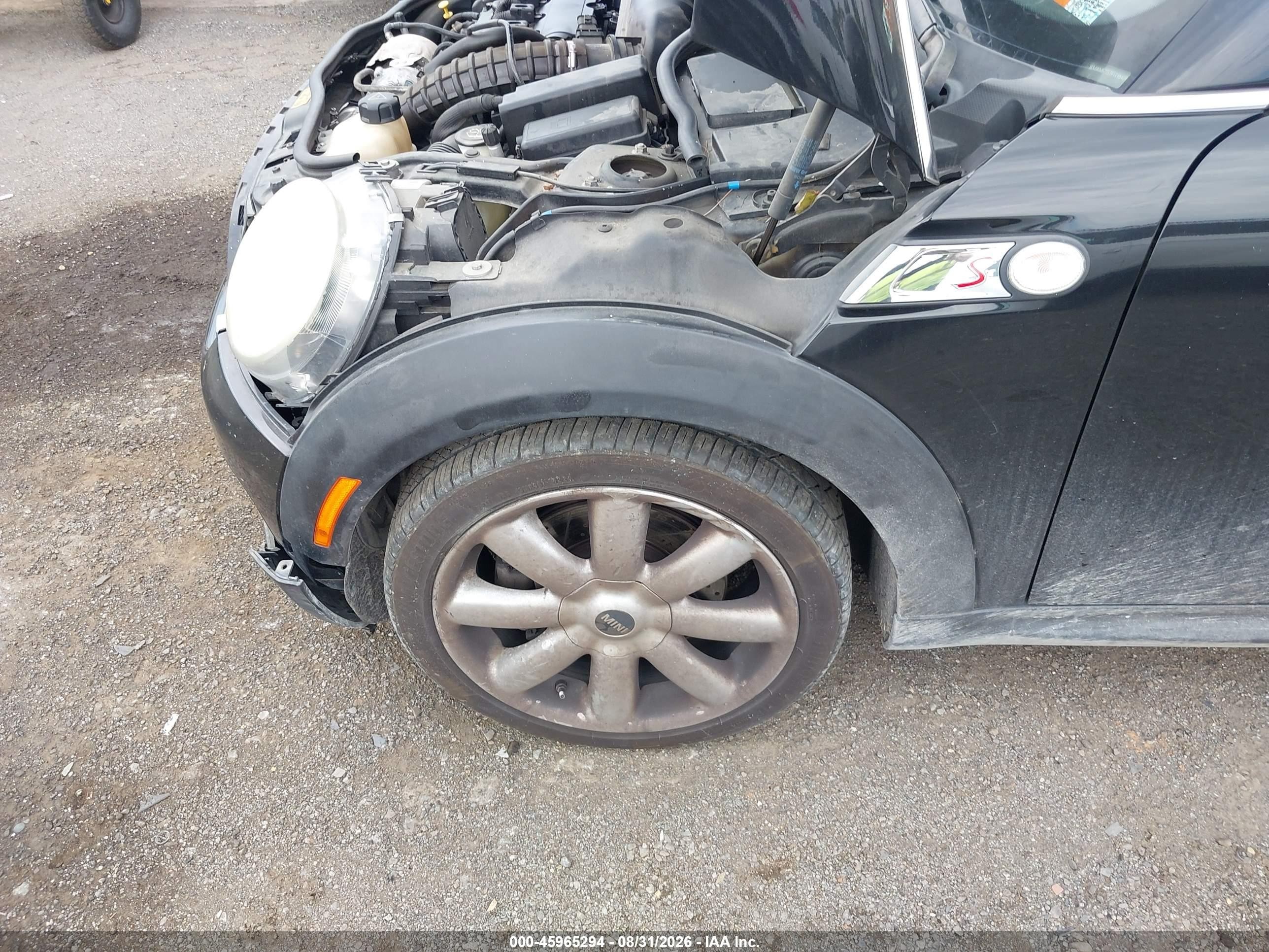 2009 Mini Cooper S   Black vin: WMWMF73539TT98409