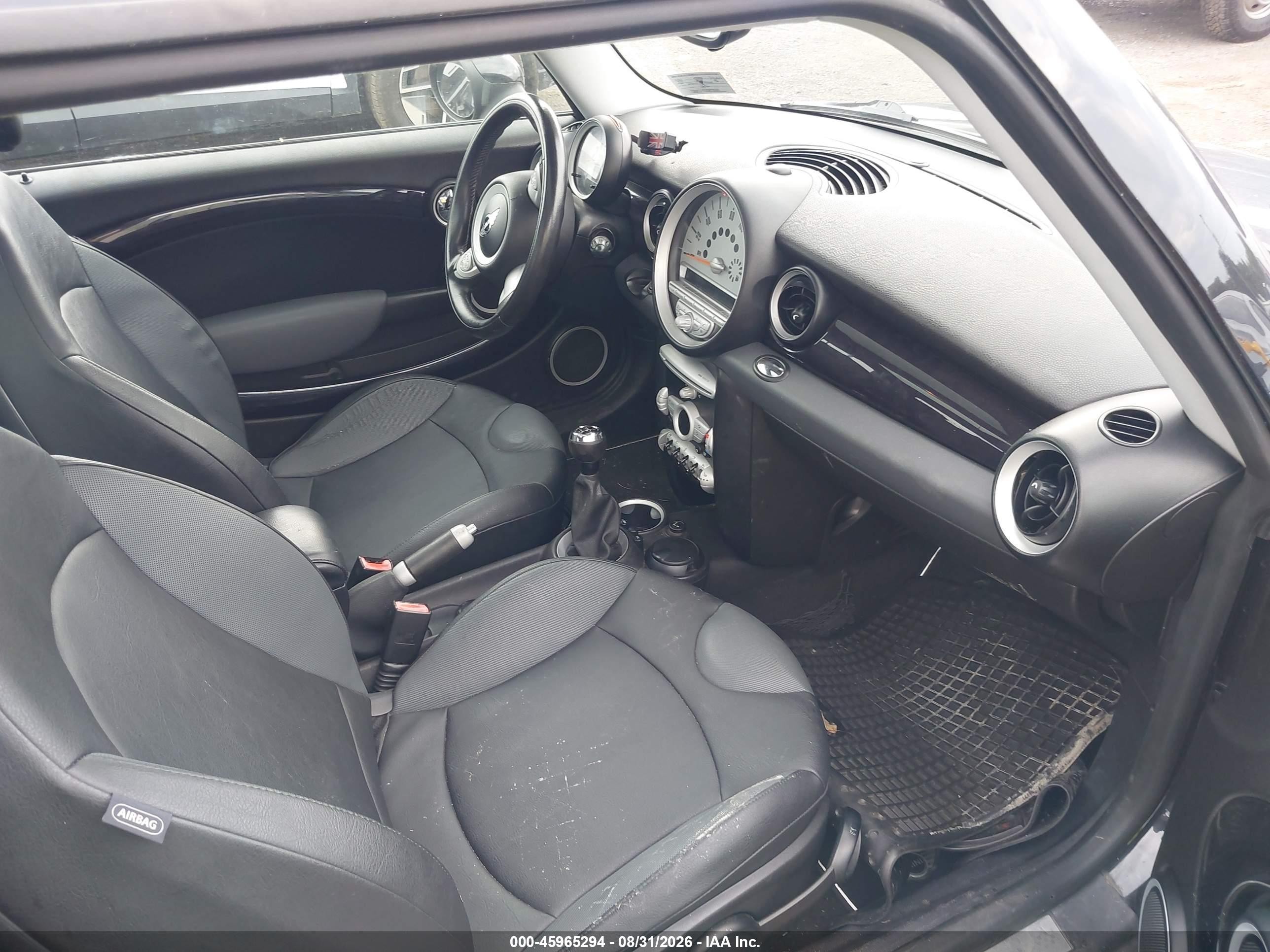 2009 Mini Cooper S   Black vin: WMWMF73539TT98409