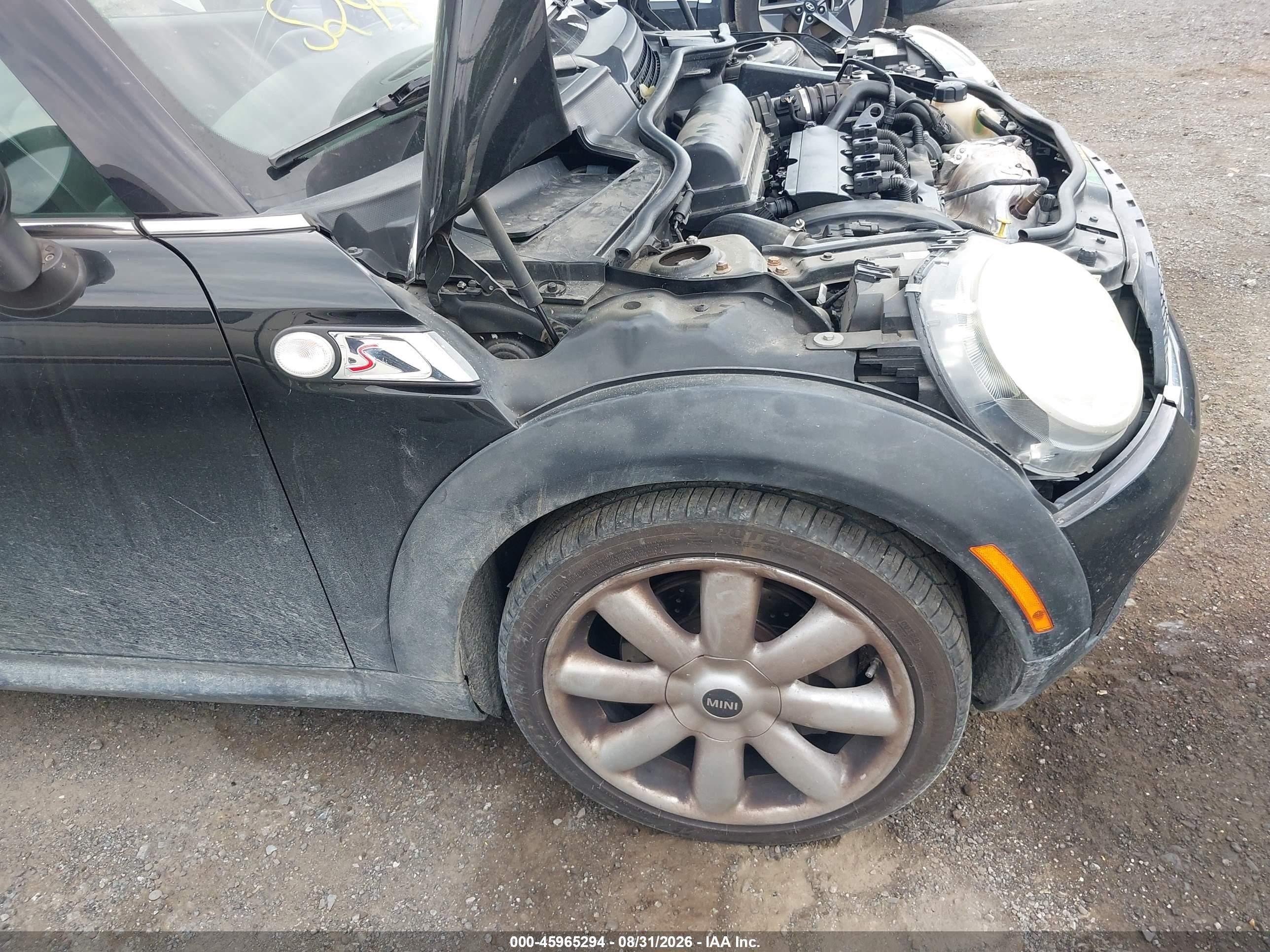 2009 Mini Cooper S   Black vin: WMWMF73539TT98409