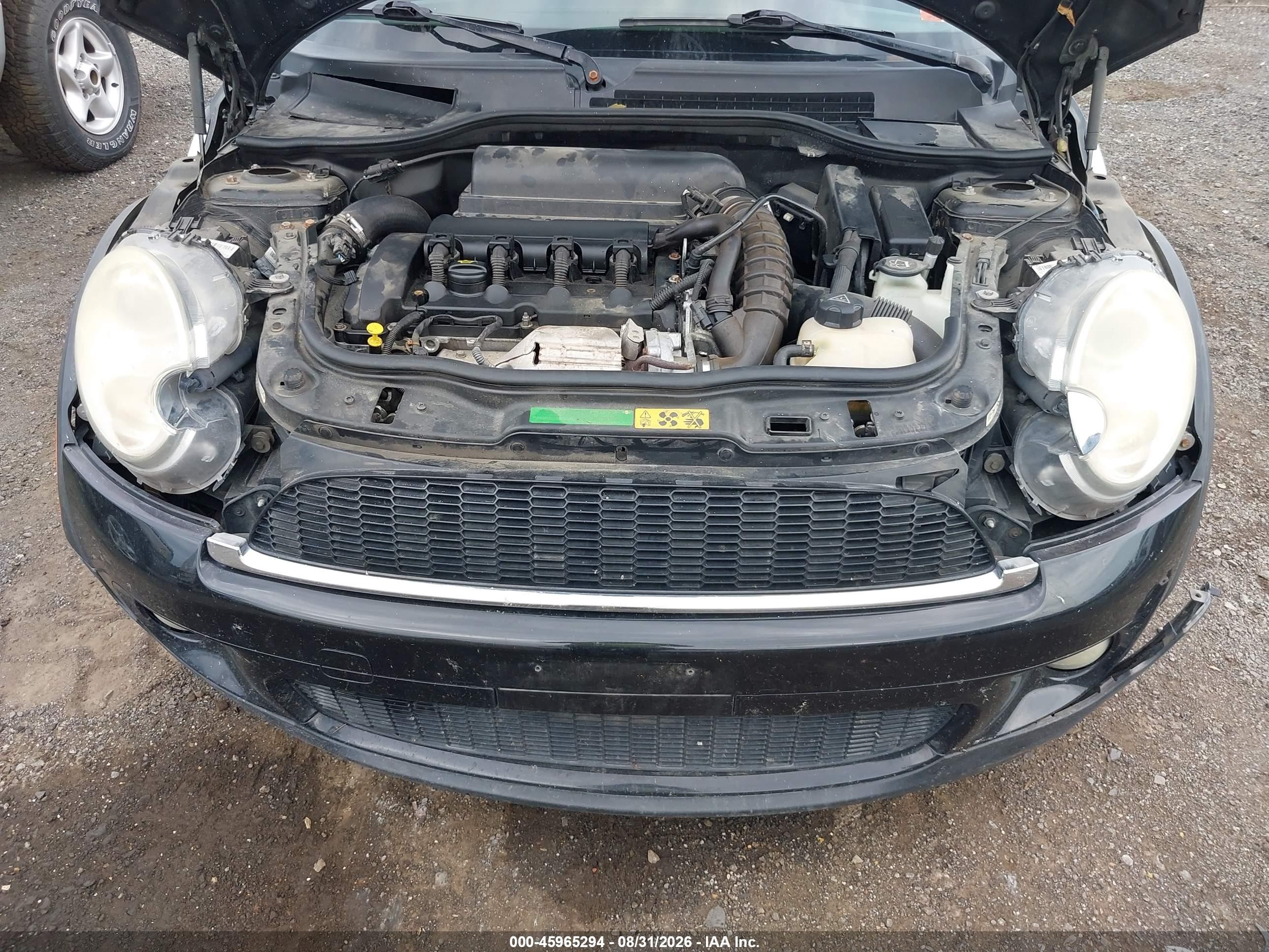 2009 Mini Cooper S   Black vin: WMWMF73539TT98409