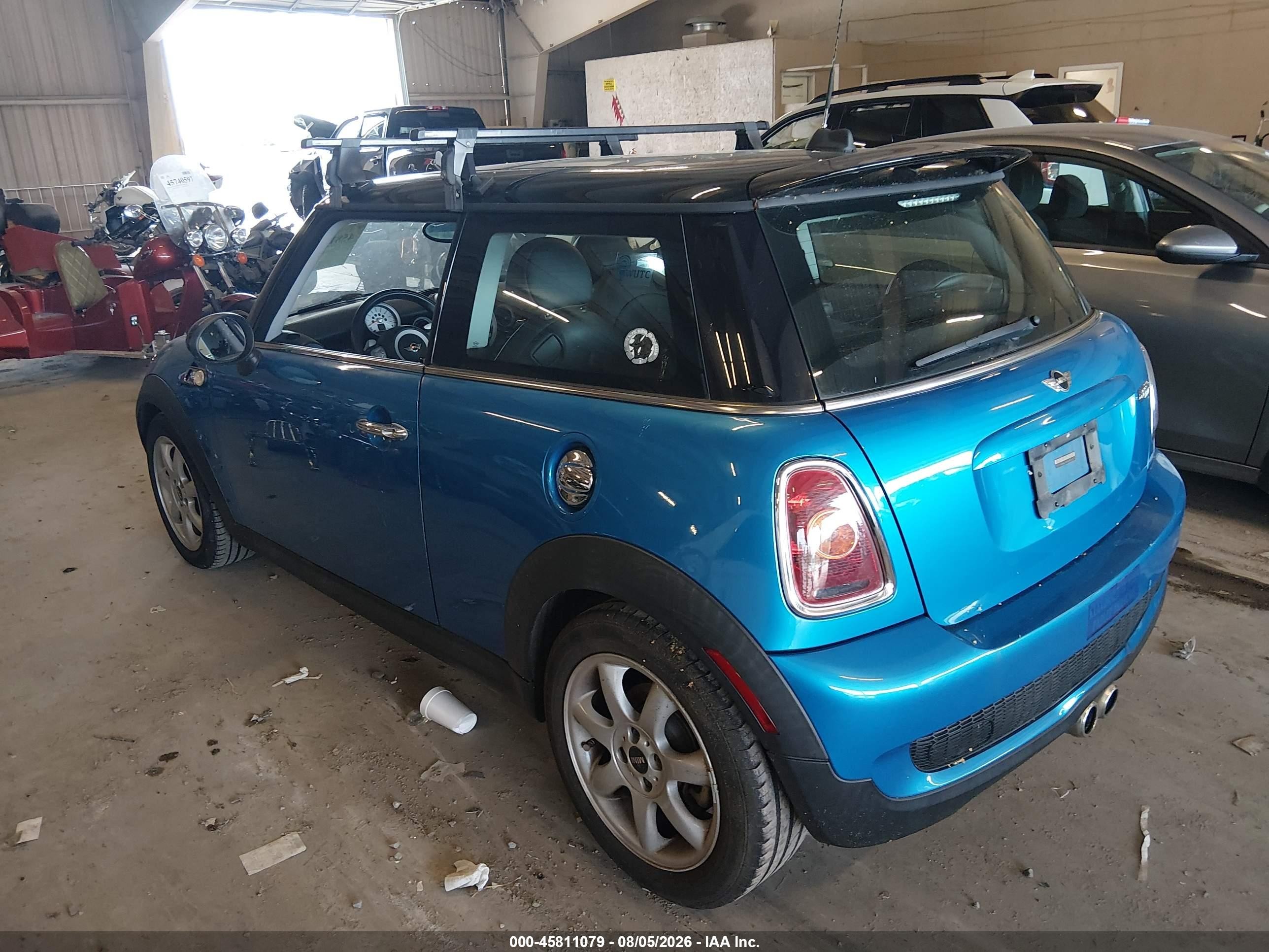 2009 Mini Cooper S   Blue vin: WMWMF73559TW88117