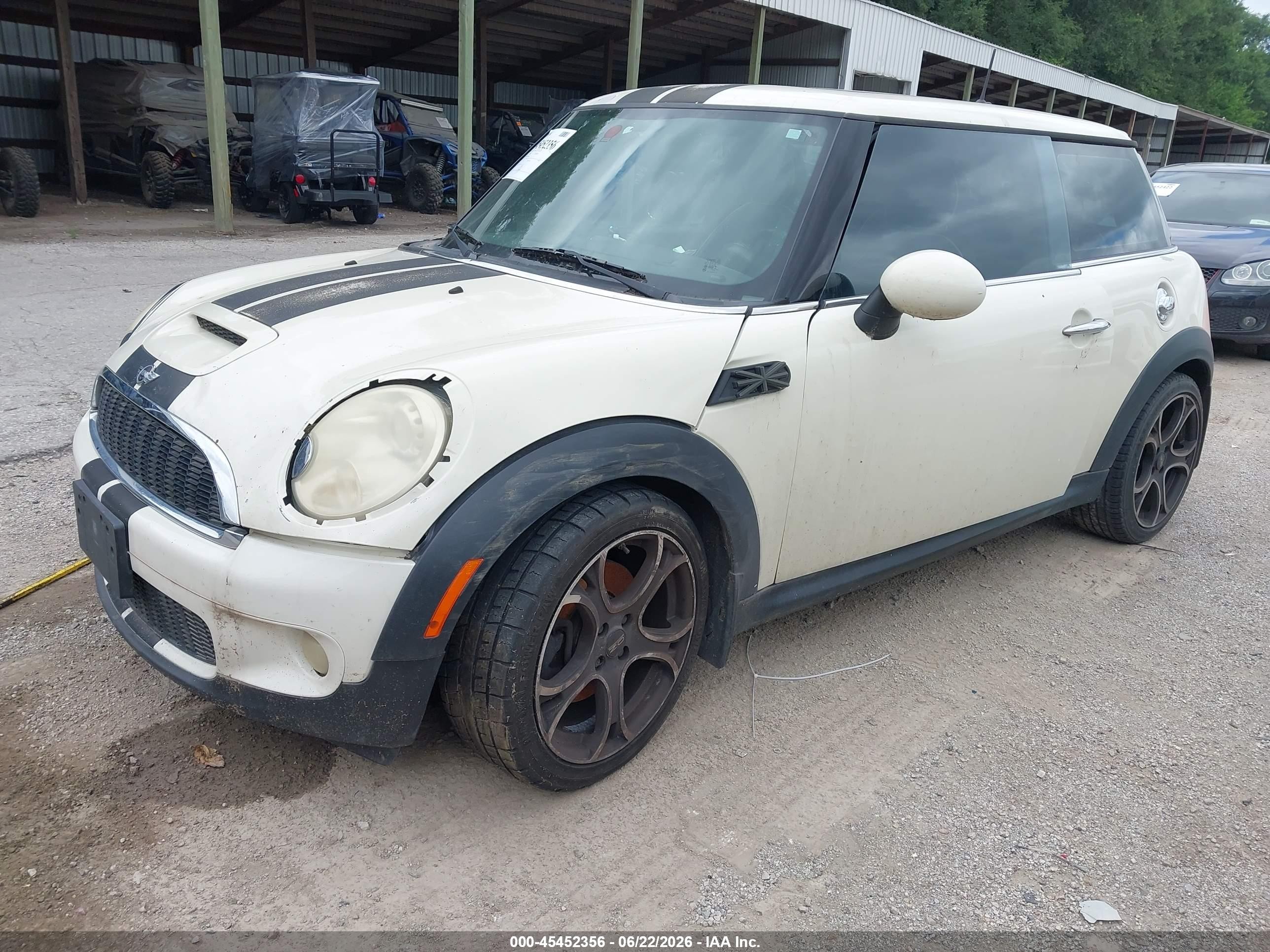 2009 Mini Cooper S   Cream vin: WMWMF73569TW81600