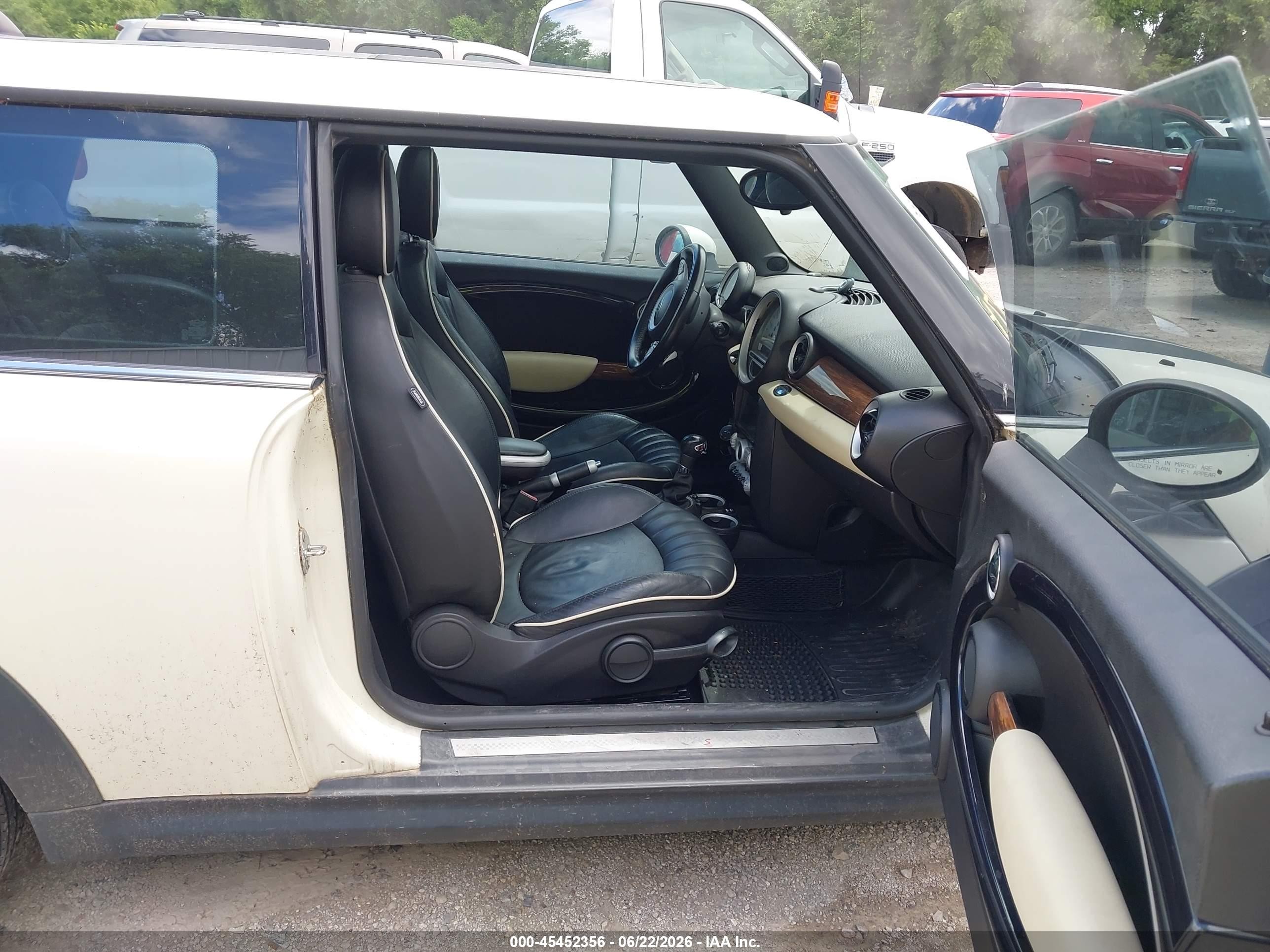 2009 Mini Cooper S   Cream vin: WMWMF73569TW81600