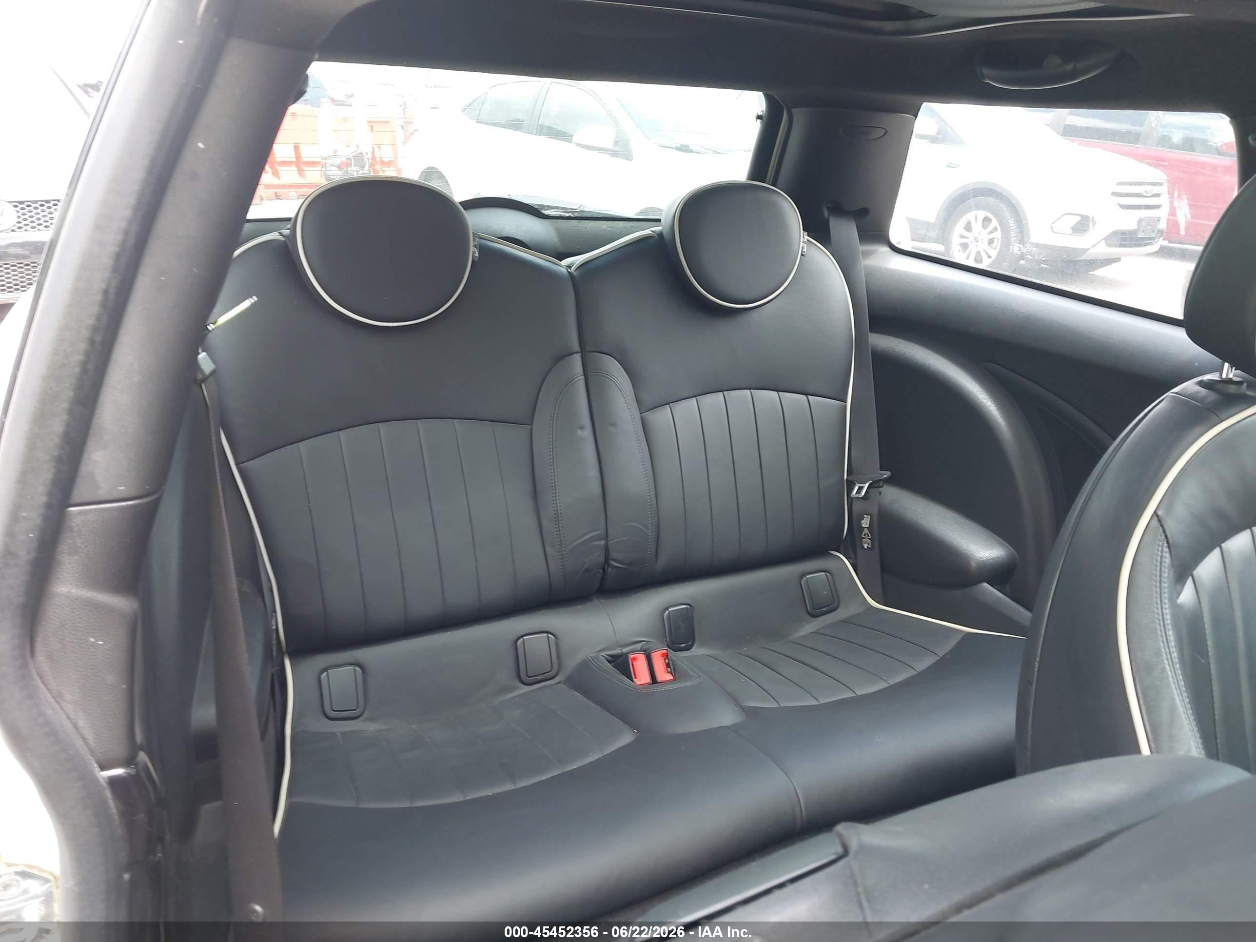 2009 Mini Cooper S   Cream vin: WMWMF73569TW81600