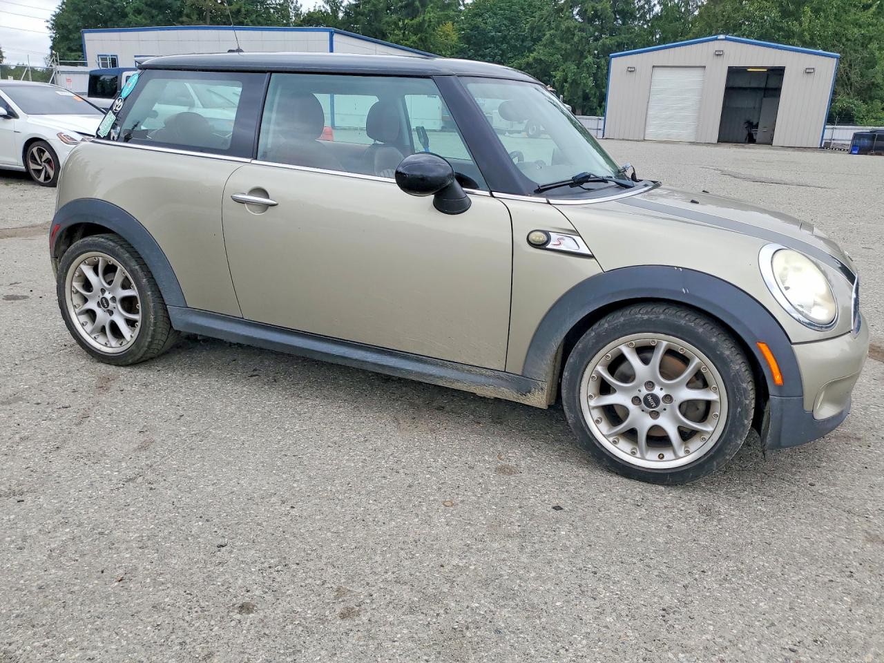 2007 Mini Cooper S Tan vin: WMWMF73577TL83361