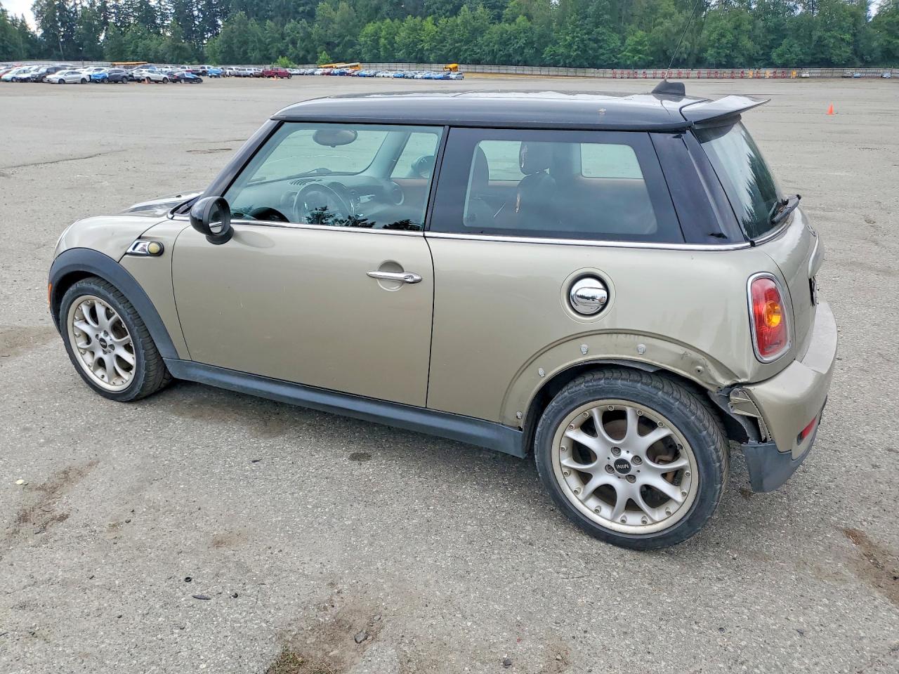 2007 Mini Cooper S Tan vin: WMWMF73577TL83361
