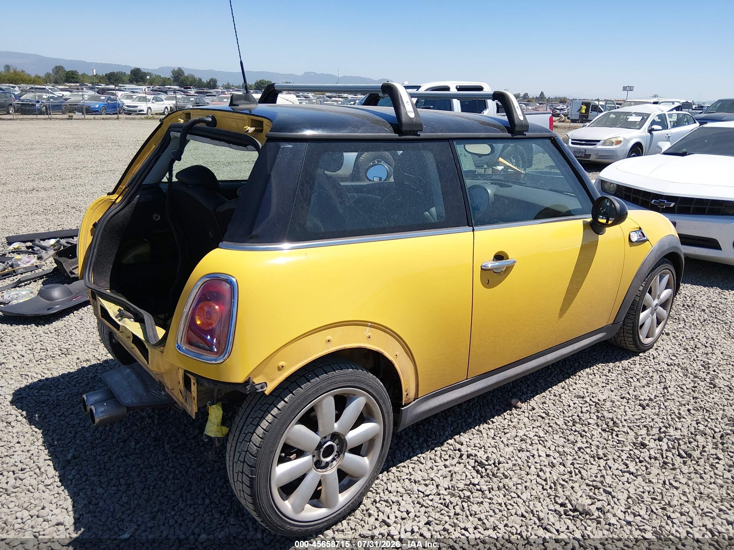 2009 Mini Cooper S Yellow vin: WMWMF73579TW87728