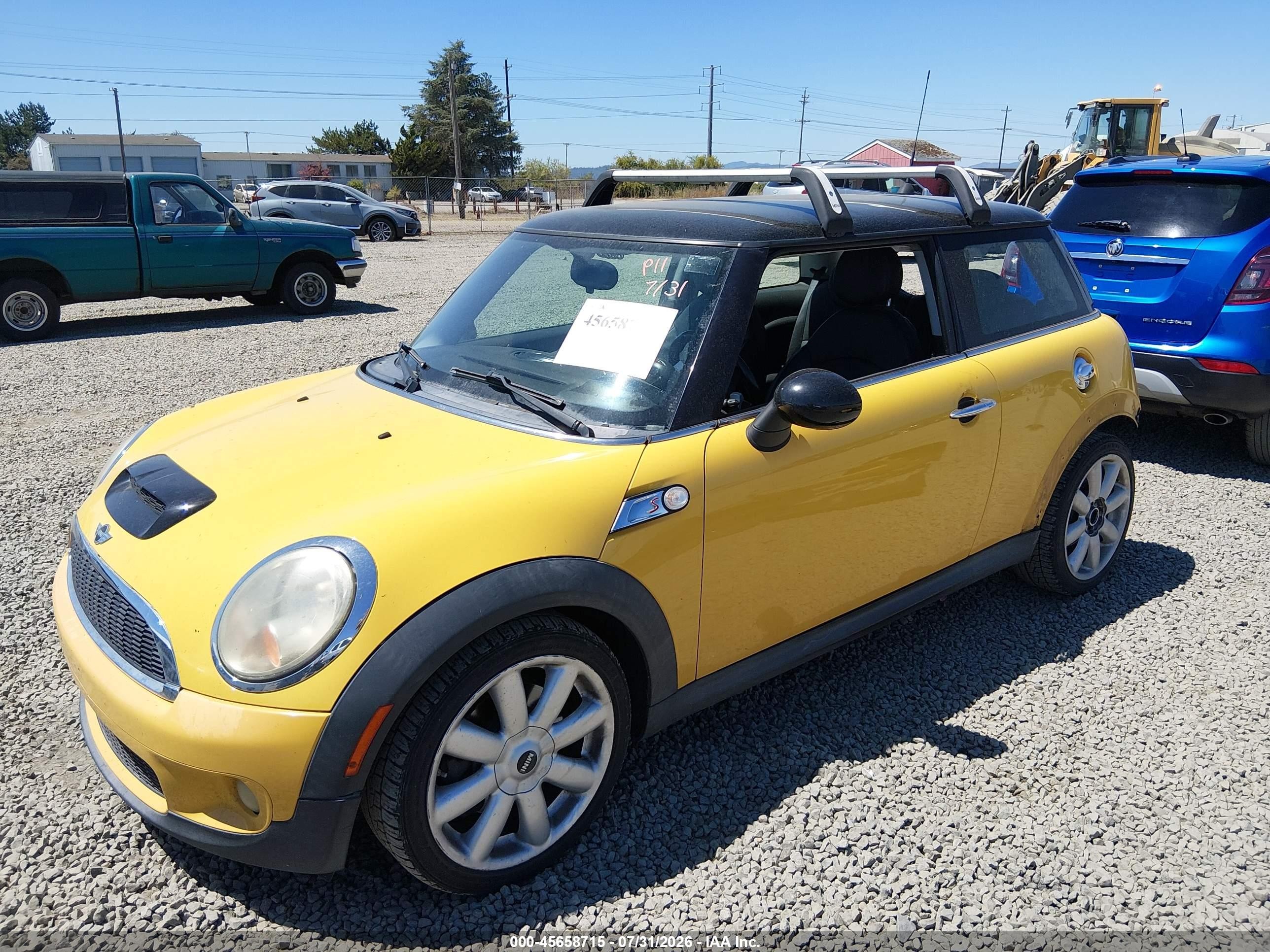 2009 Mini Cooper S Yellow vin: WMWMF73579TW87728