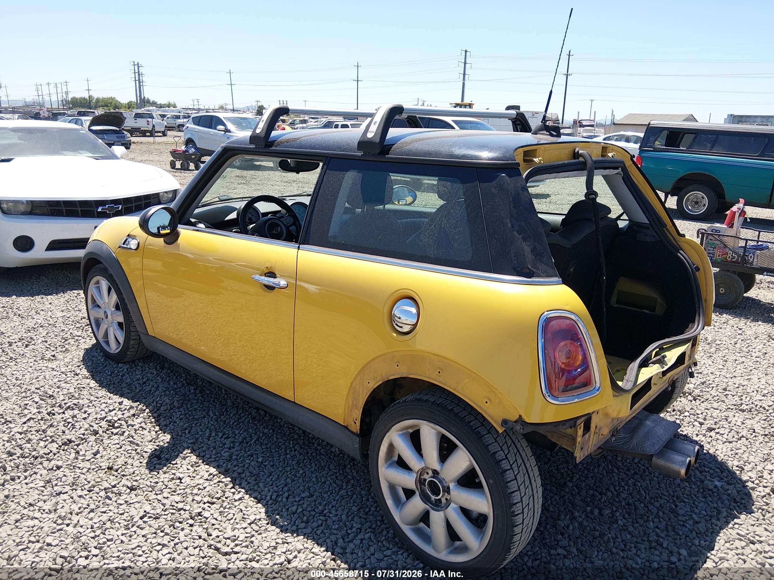 2009 Mini Cooper S Yellow vin: WMWMF73579TW87728