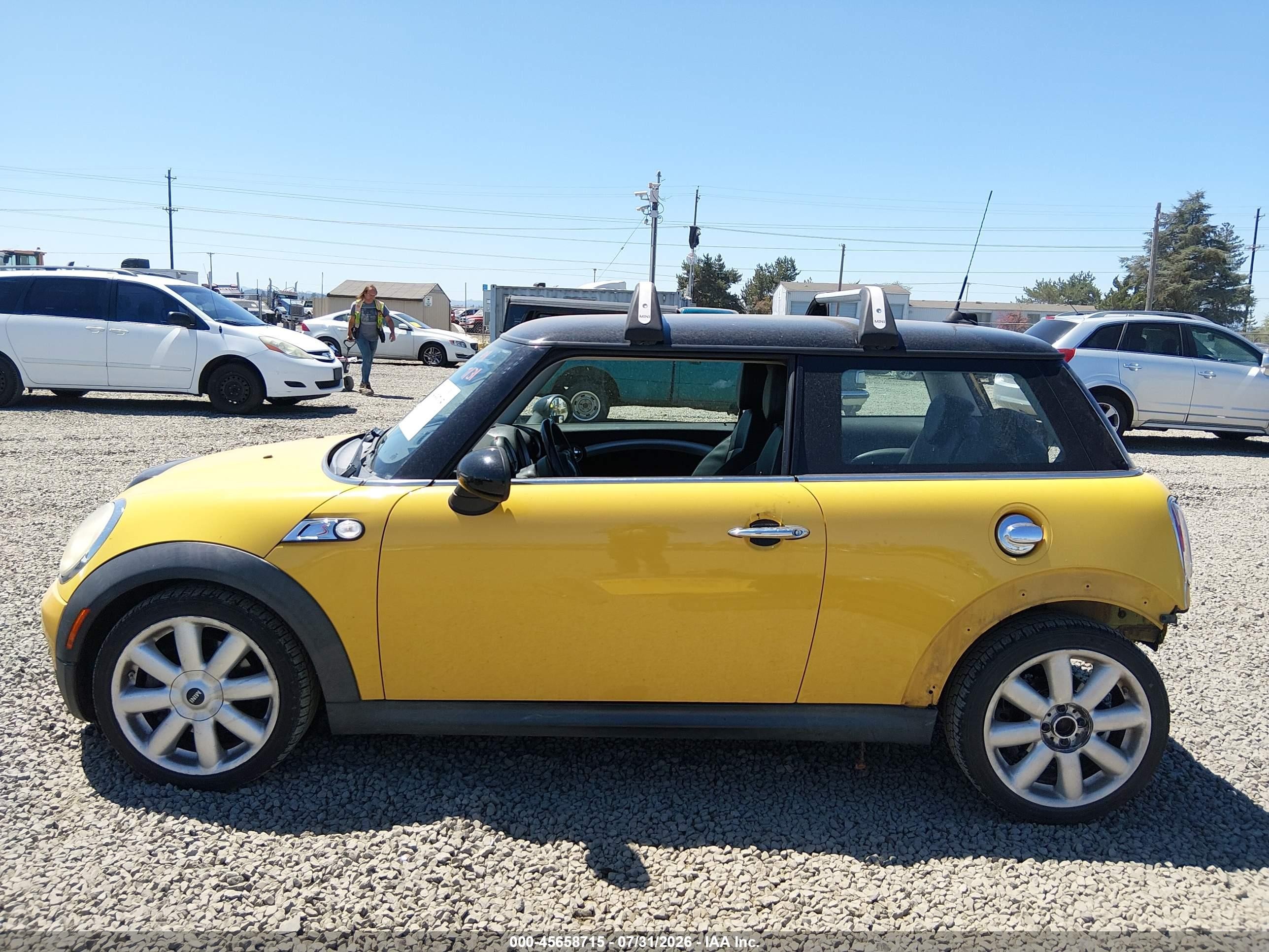 2009 Mini Cooper S Yellow vin: WMWMF73579TW87728