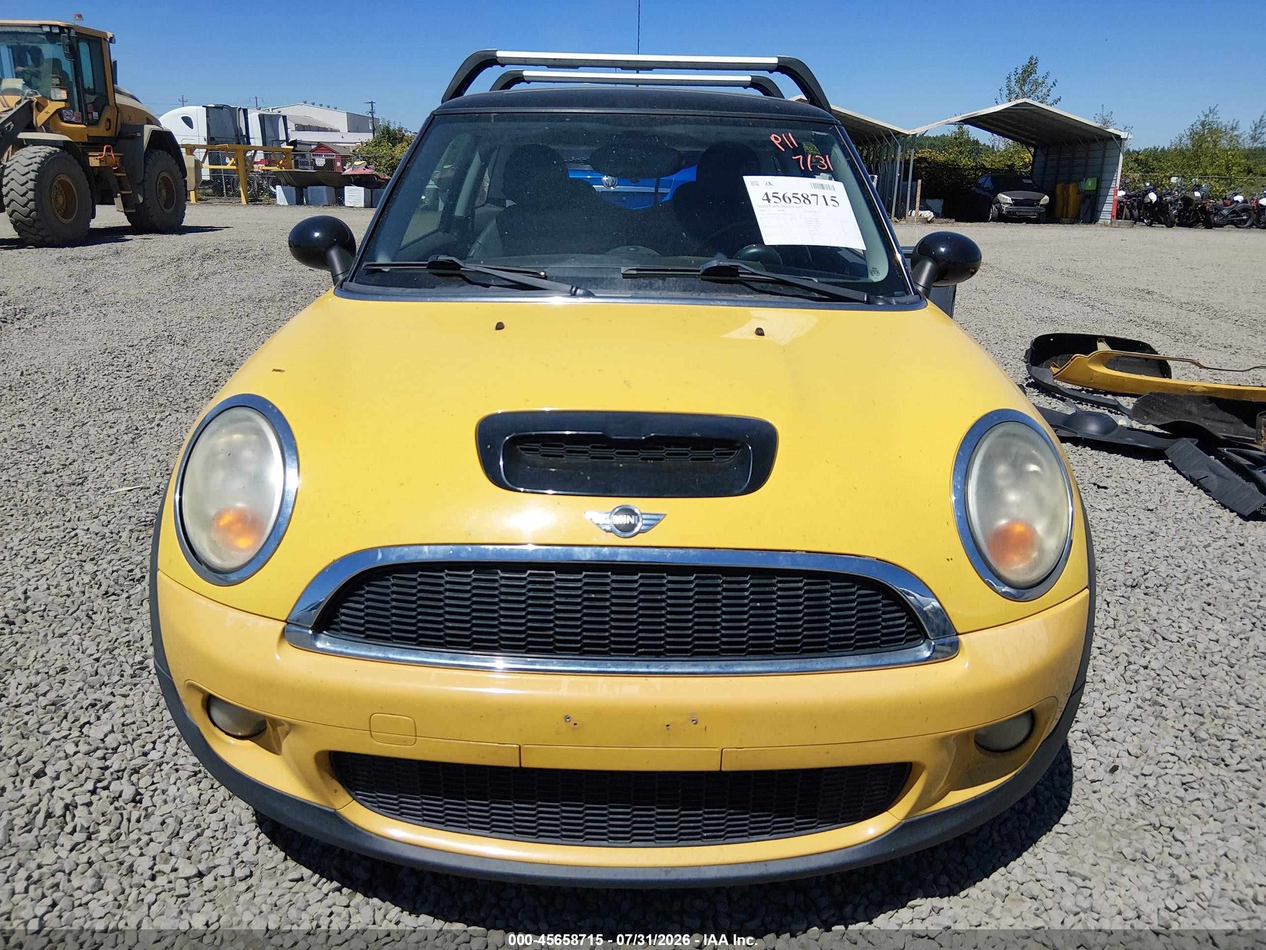 2009 Mini Cooper S Yellow vin: WMWMF73579TW87728