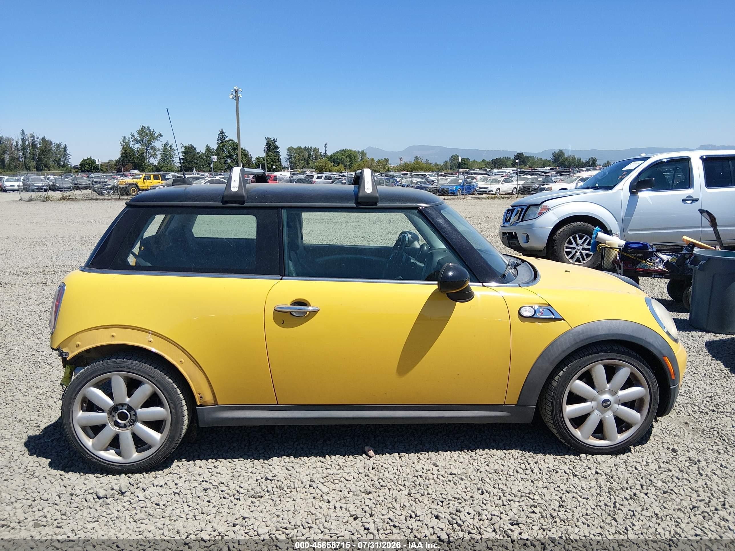 2009 Mini Cooper S Yellow vin: WMWMF73579TW87728