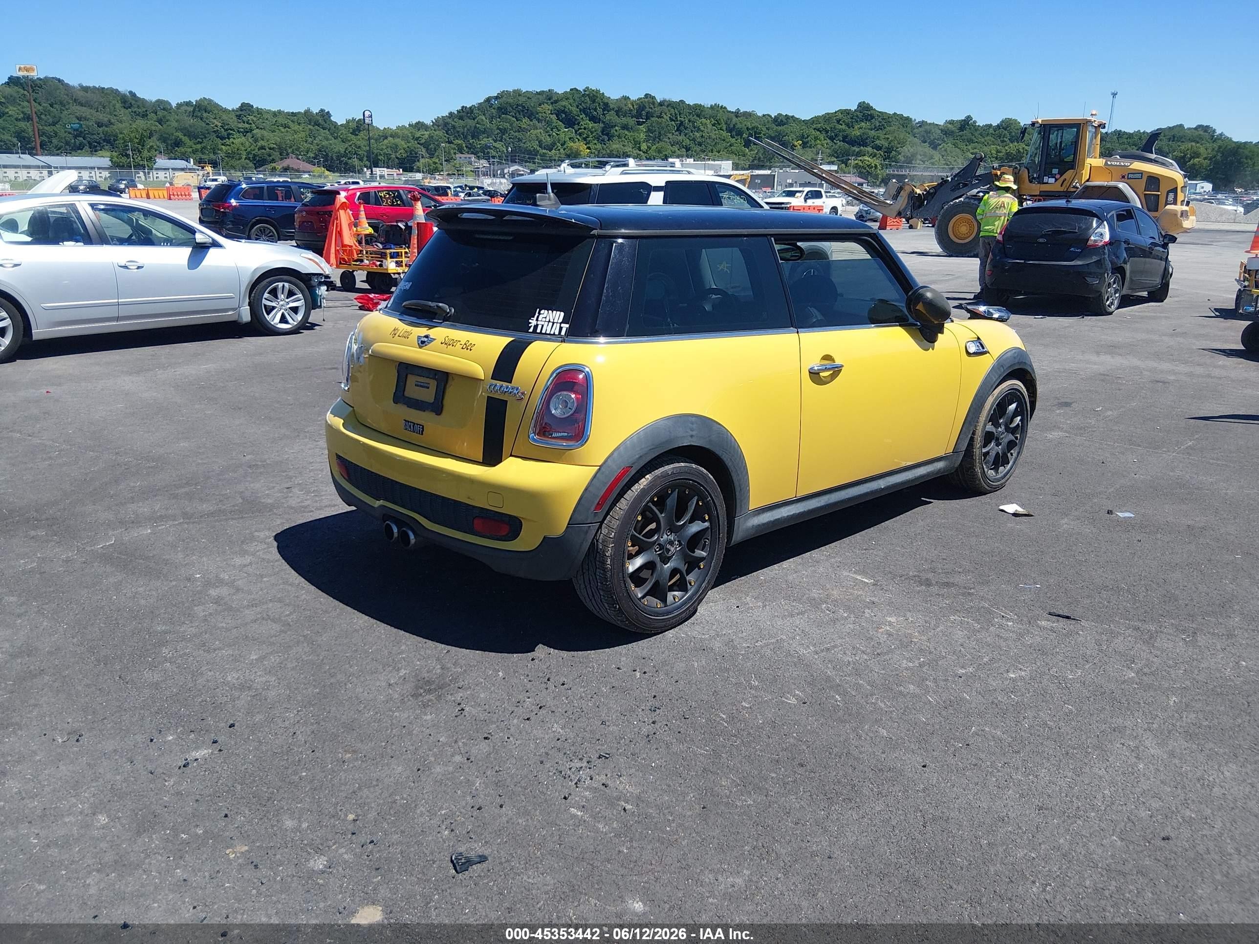 2009 Mini Cooper S   Yellow vin: WMWMF73589TT99460