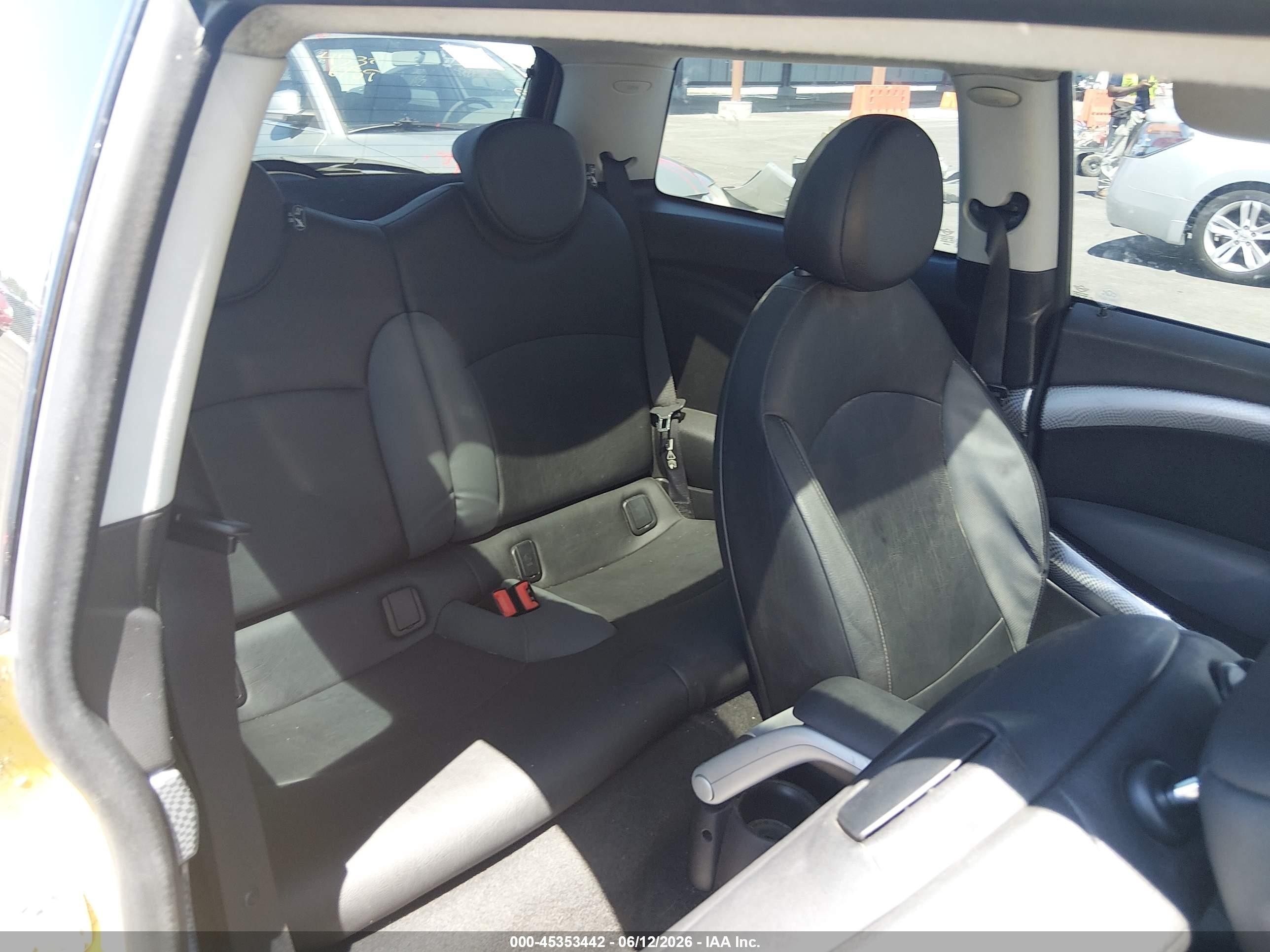 2009 Mini Cooper S   Yellow vin: WMWMF73589TT99460