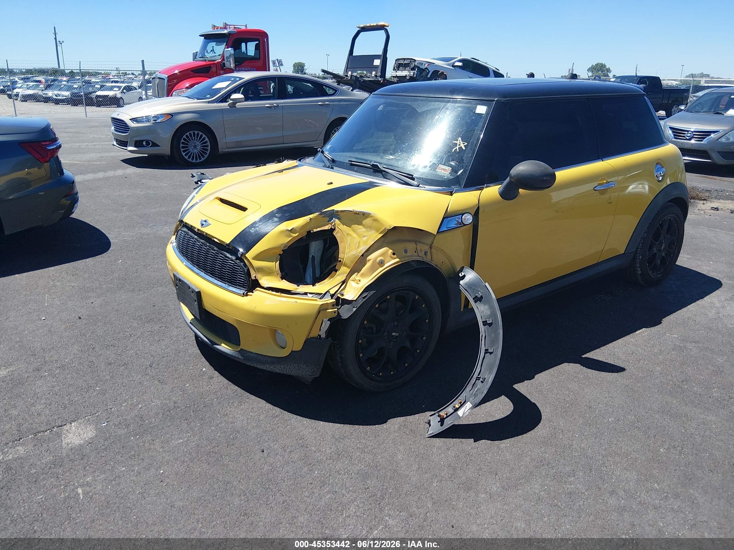 2009 Mini Cooper S   Yellow vin: WMWMF73589TT99460