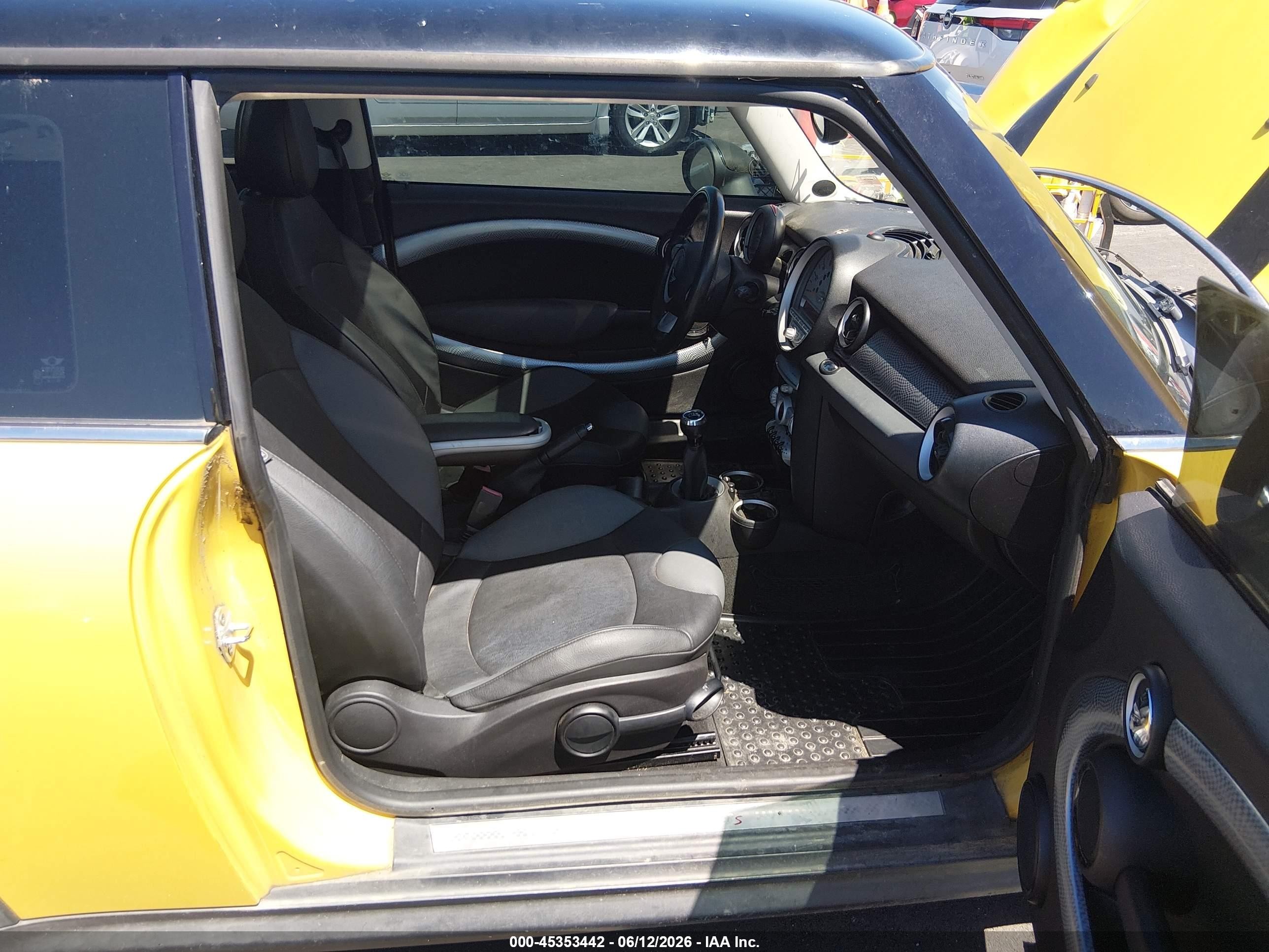 2009 Mini Cooper S   Yellow vin: WMWMF73589TT99460