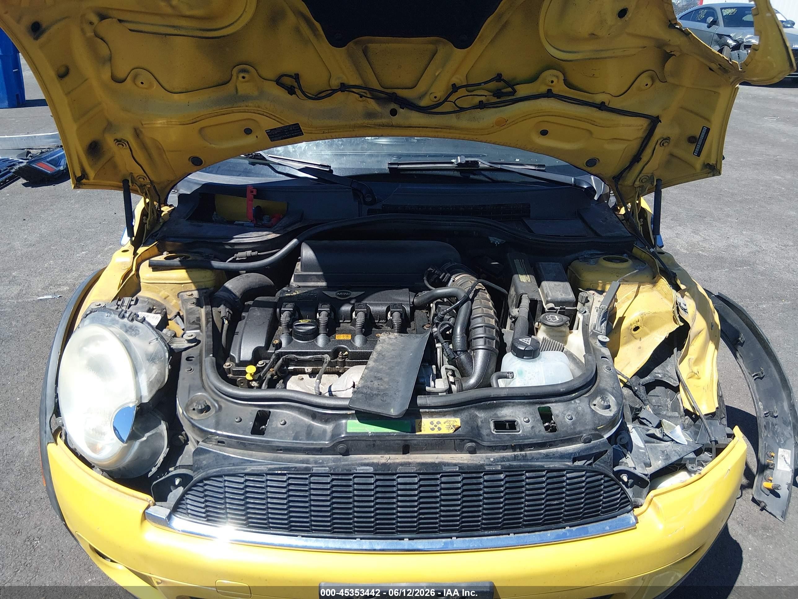 2009 Mini Cooper S   Yellow vin: WMWMF73589TT99460