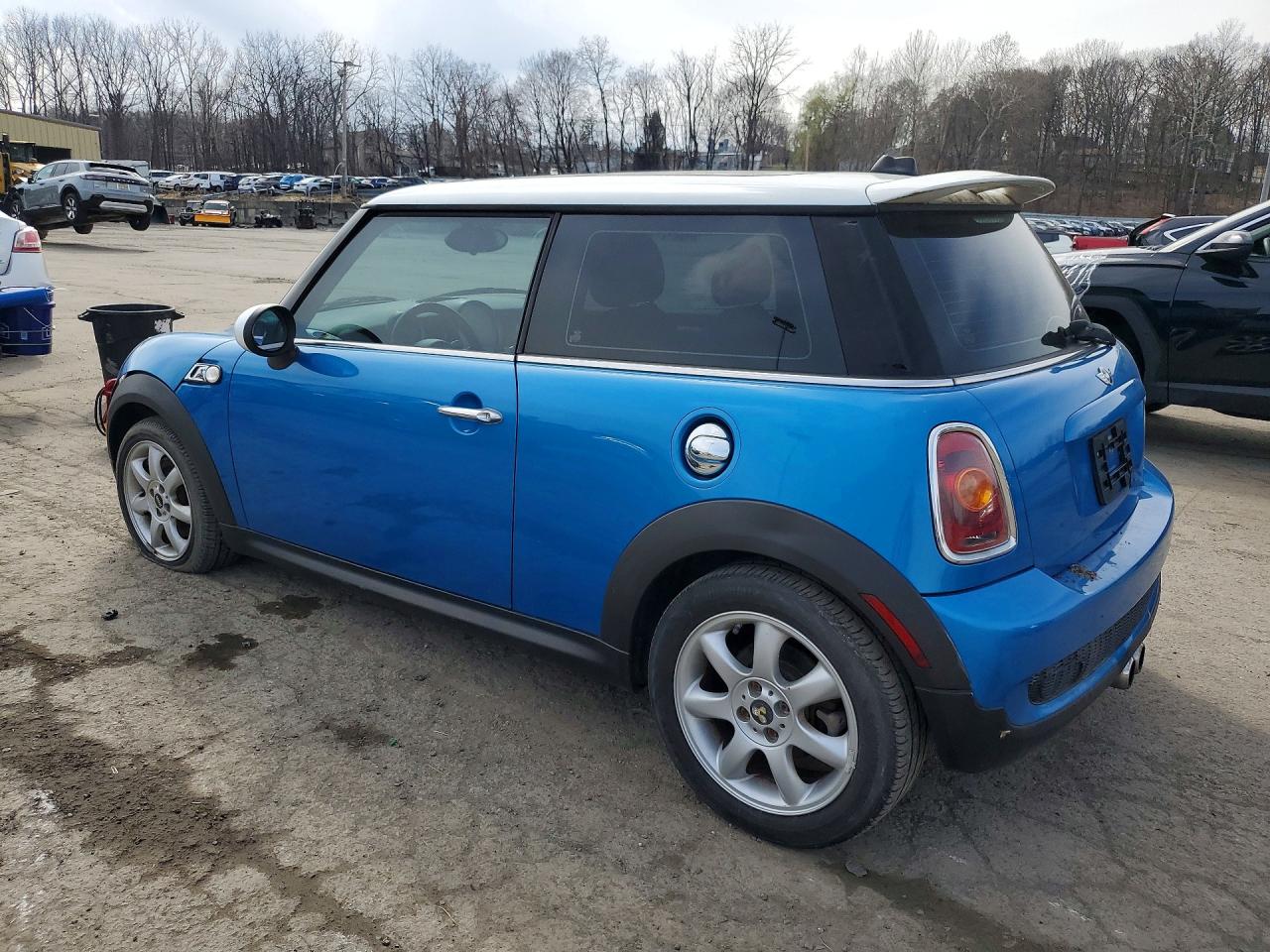 2009 Mini Cooper S Blue vin: WMWMF73589TW87141