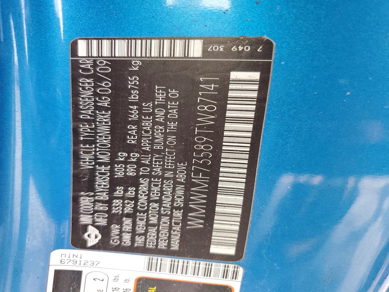 2009 Mini Cooper S Blue vin: WMWMF73589TW87141