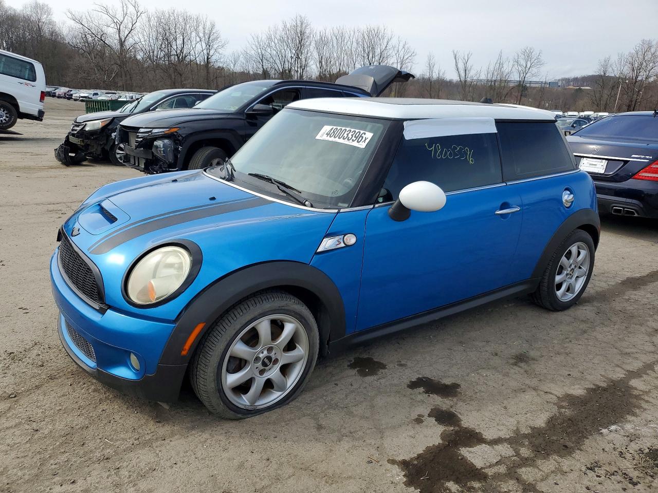 2009 Mini Cooper S Blue vin: WMWMF73589TW87141