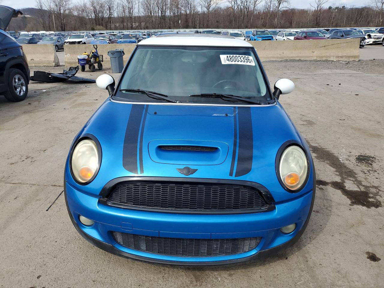 2009 Mini Cooper S Blue vin: WMWMF73589TW87141