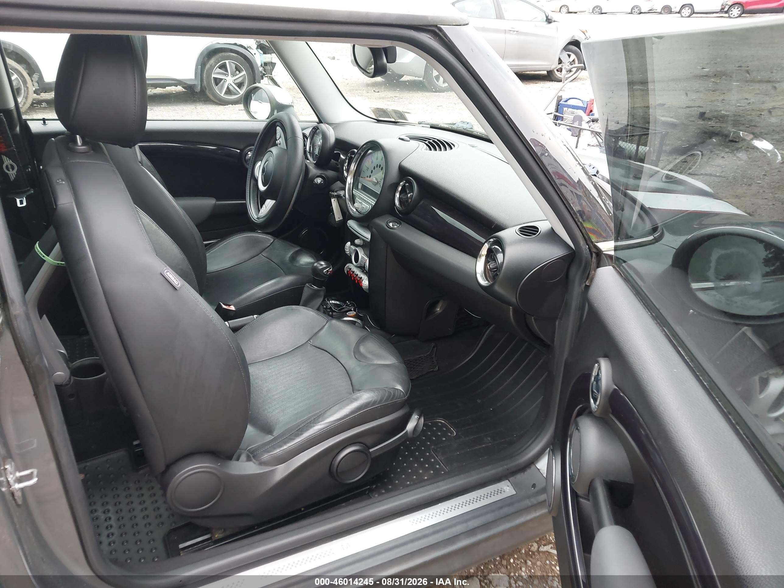 2009 Mini Cooper S   Silver vin: WMWMF735X9TW84774