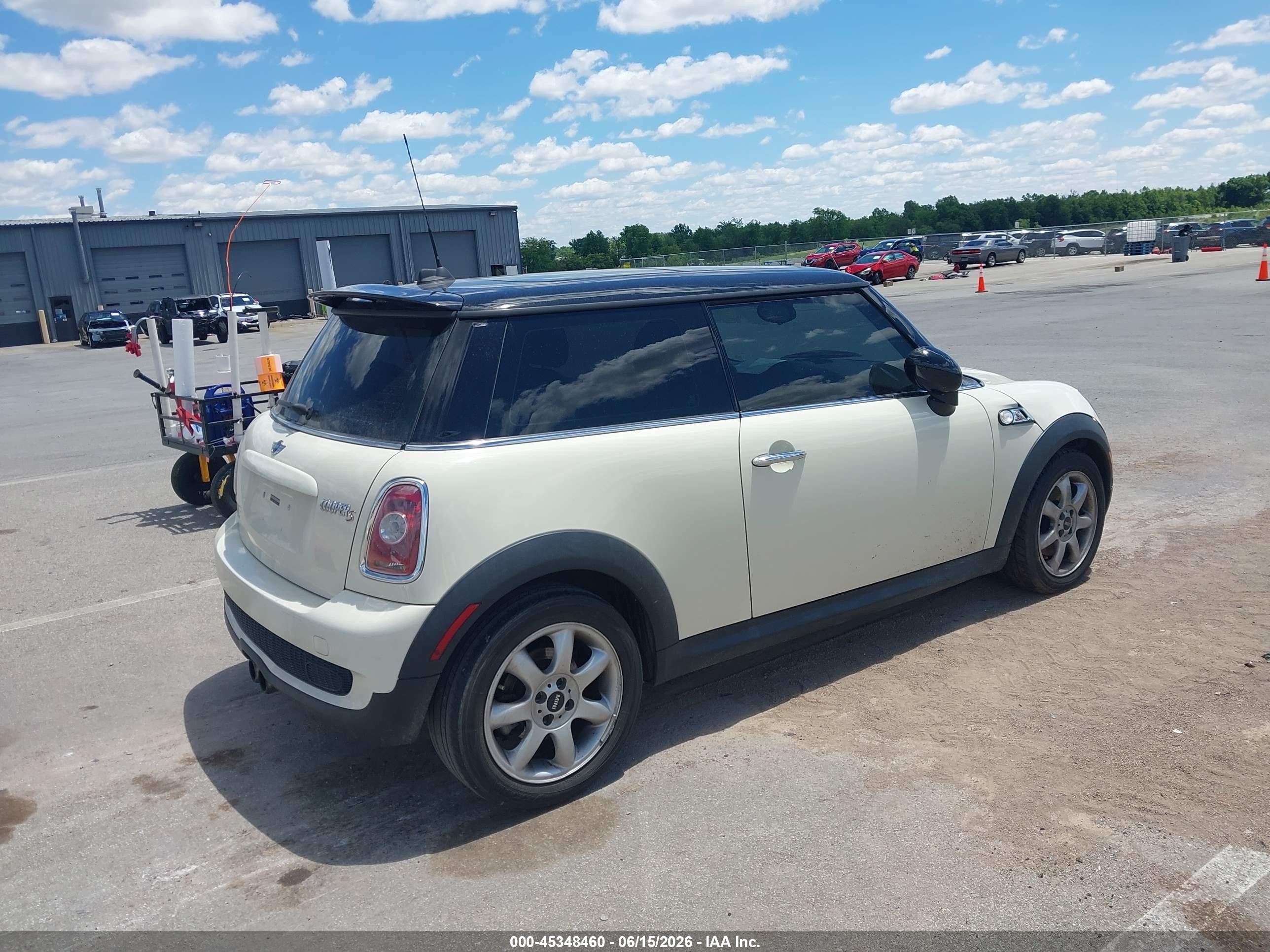 2010 Mini Cooper S   Cream vin: WMWMF7C51ATZ72218