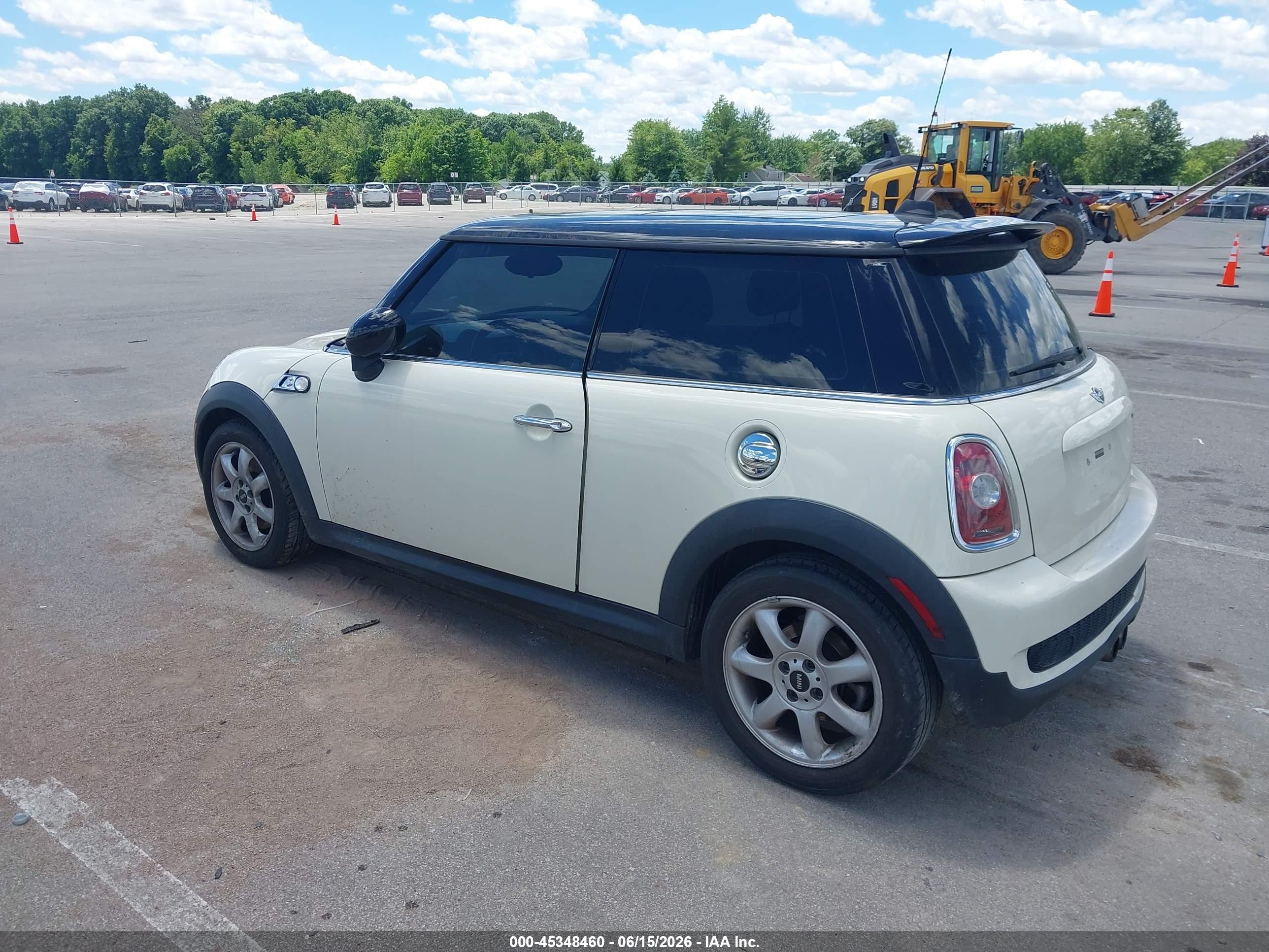 2010 Mini Cooper S   Cream vin: WMWMF7C51ATZ72218