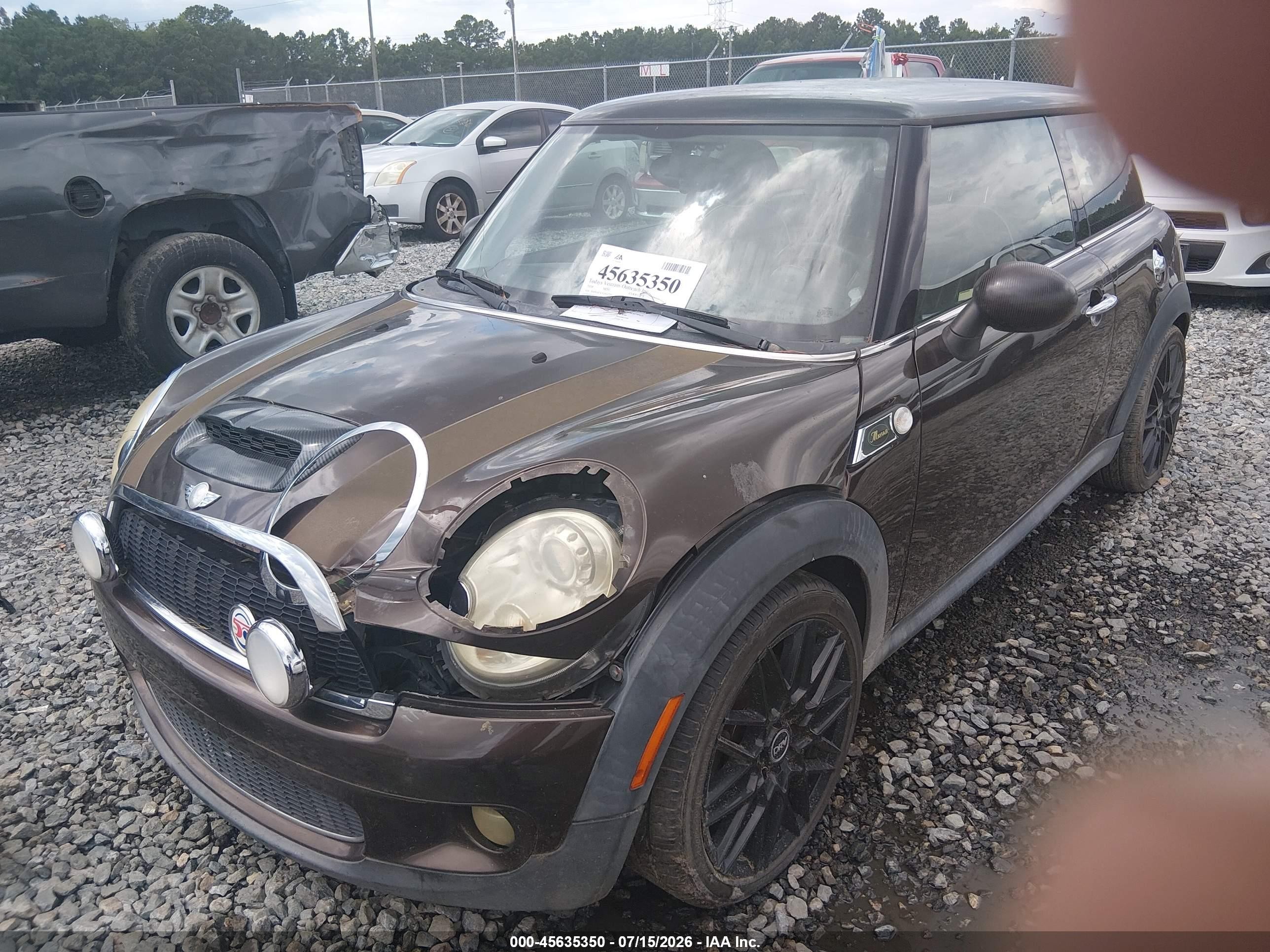 2010 Mini Cooper S   Brown vin: WMWMF7C52ATZ72521