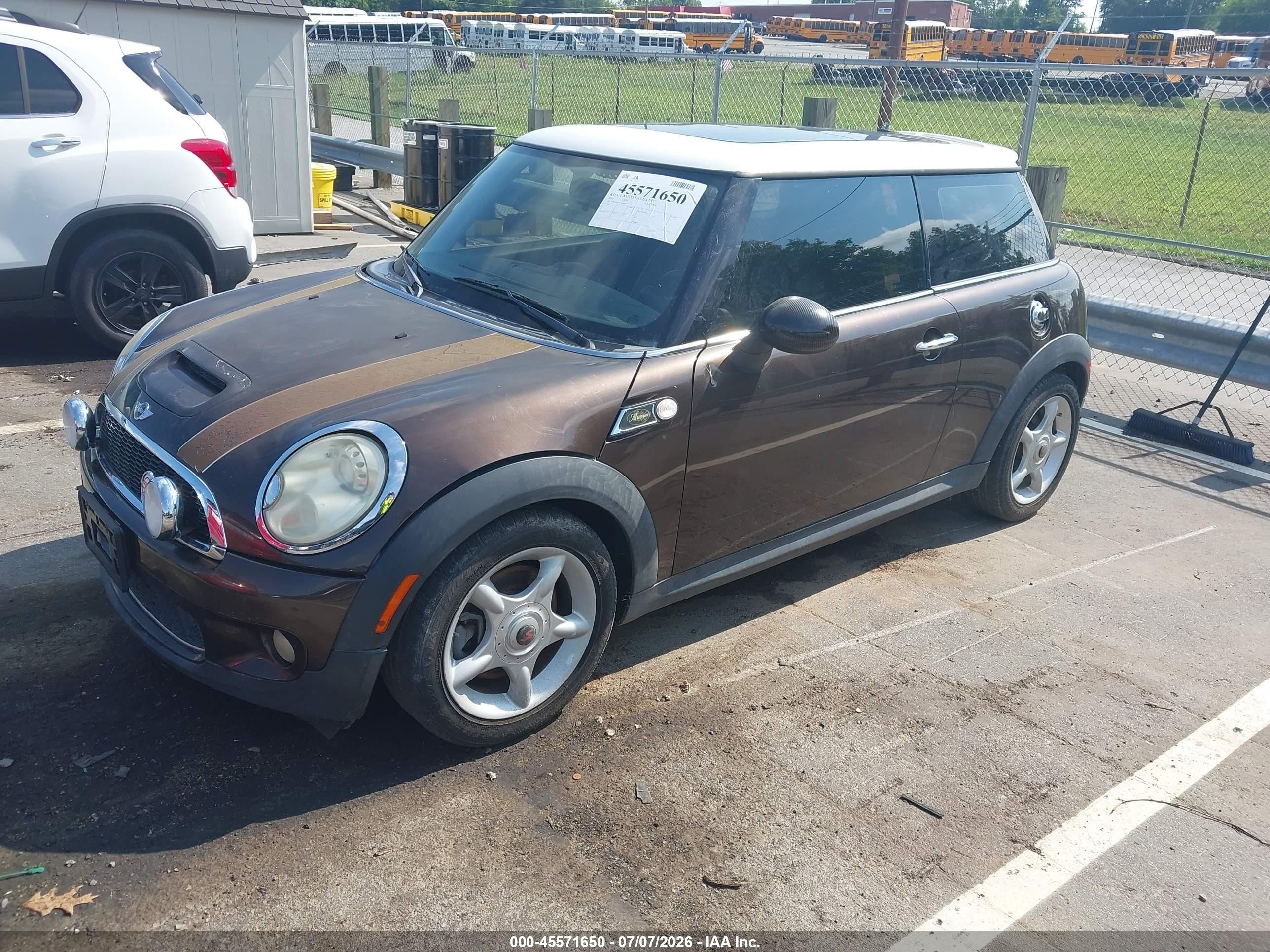 2010 Mini Cooper S   Brown vin: WMWMF7C53ATW88489
