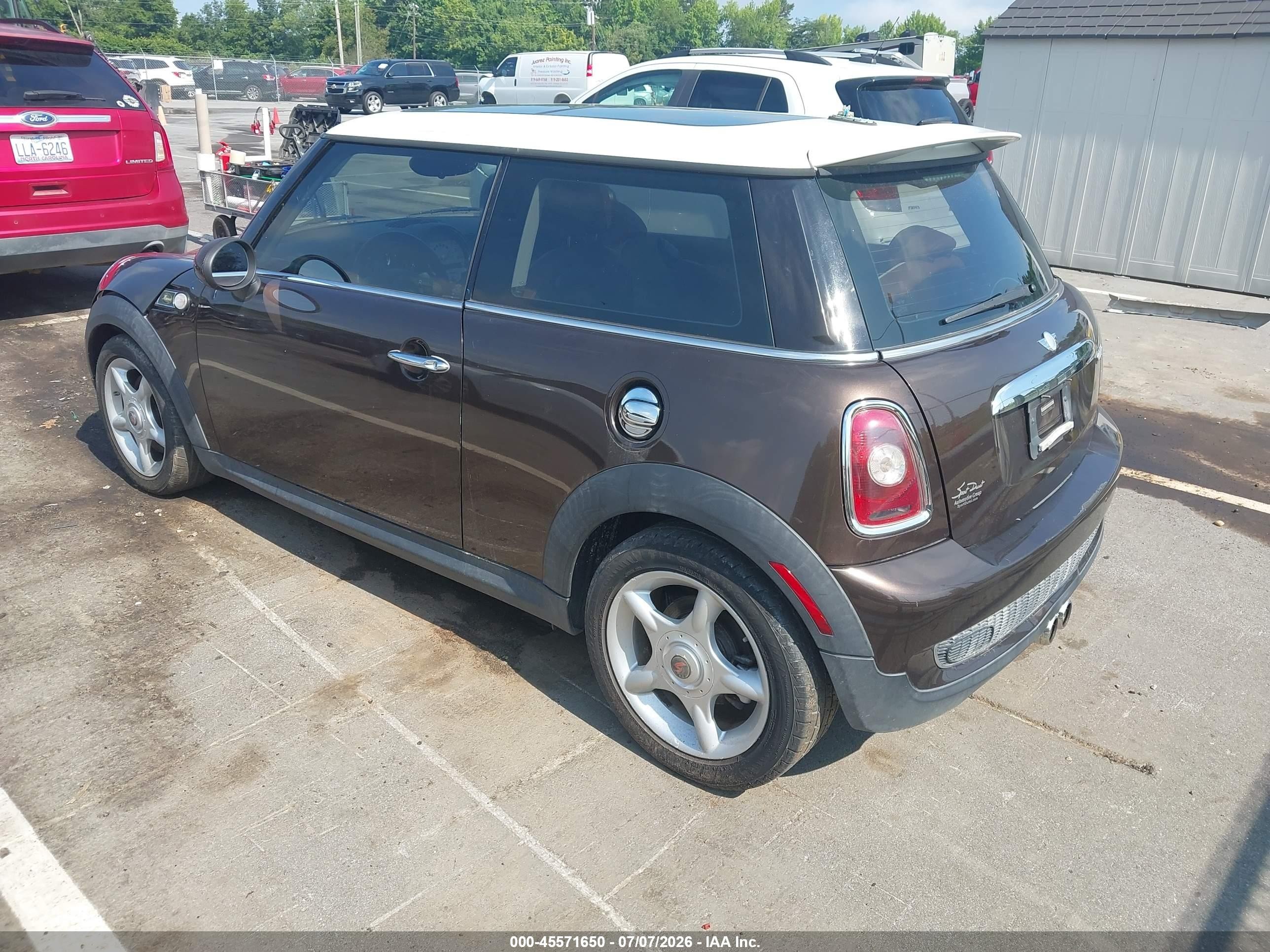 2010 Mini Cooper S   Brown vin: WMWMF7C53ATW88489