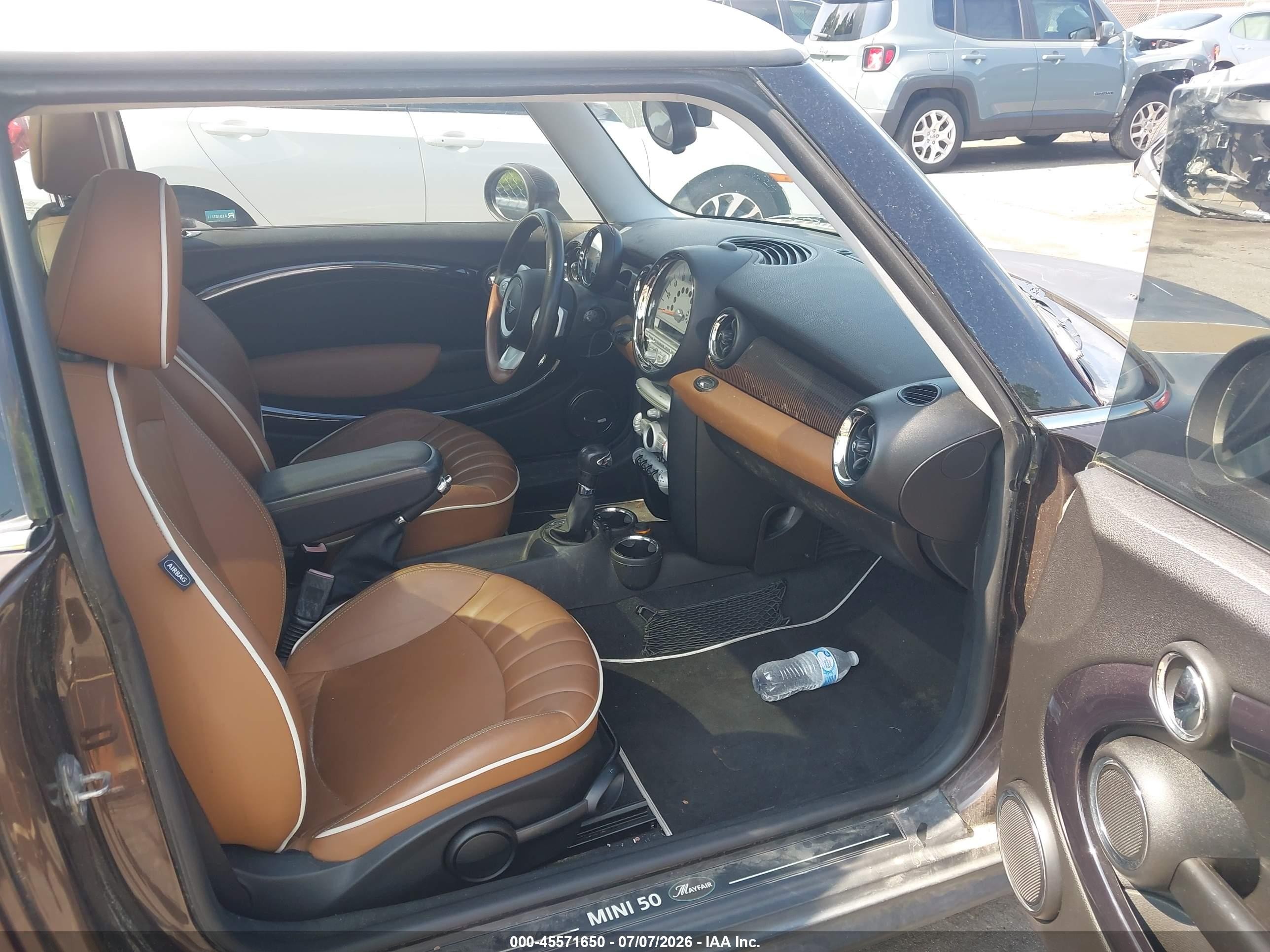 2010 Mini Cooper S   Brown vin: WMWMF7C53ATW88489