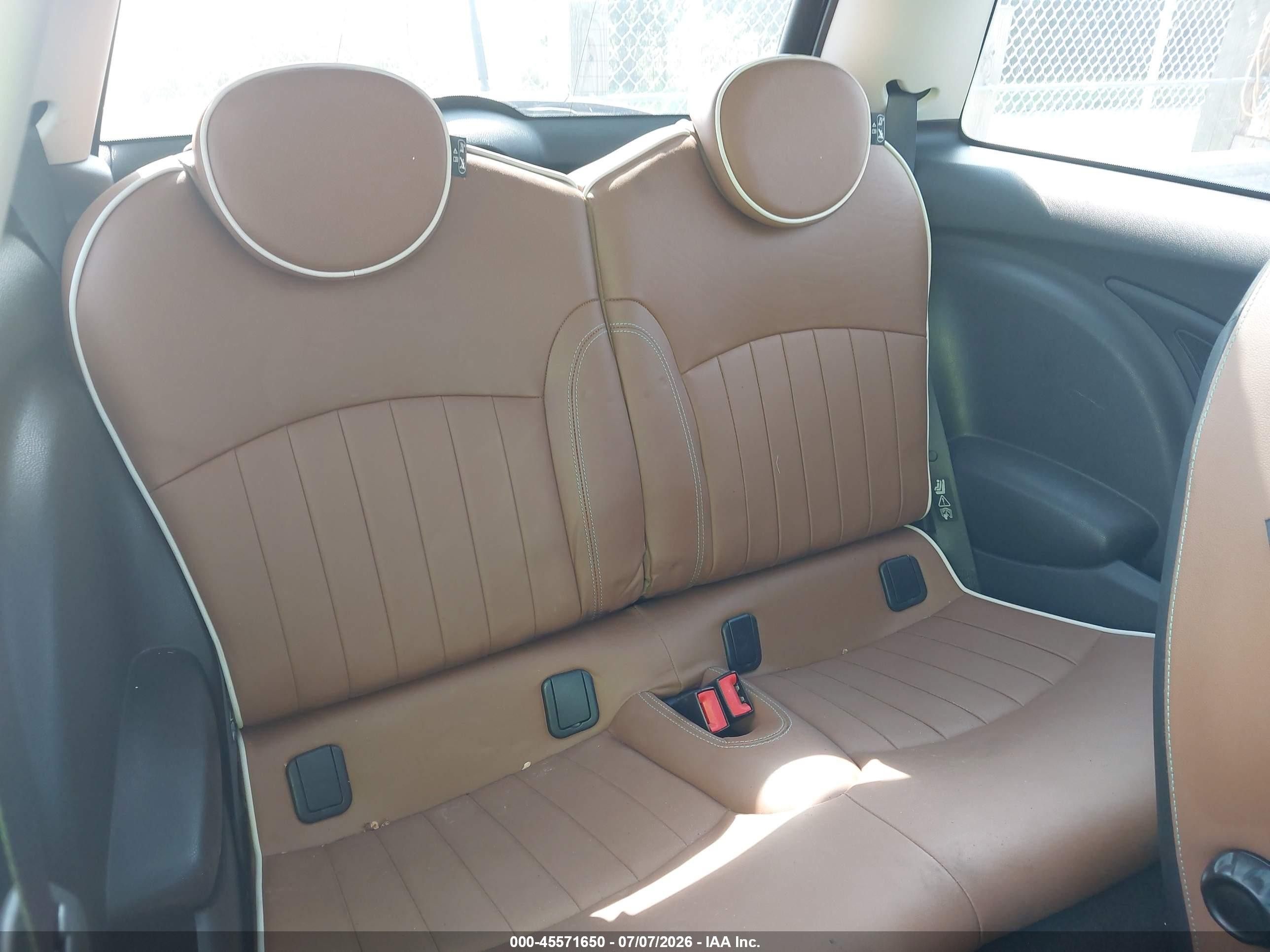 2010 Mini Cooper S   Brown vin: WMWMF7C53ATW88489