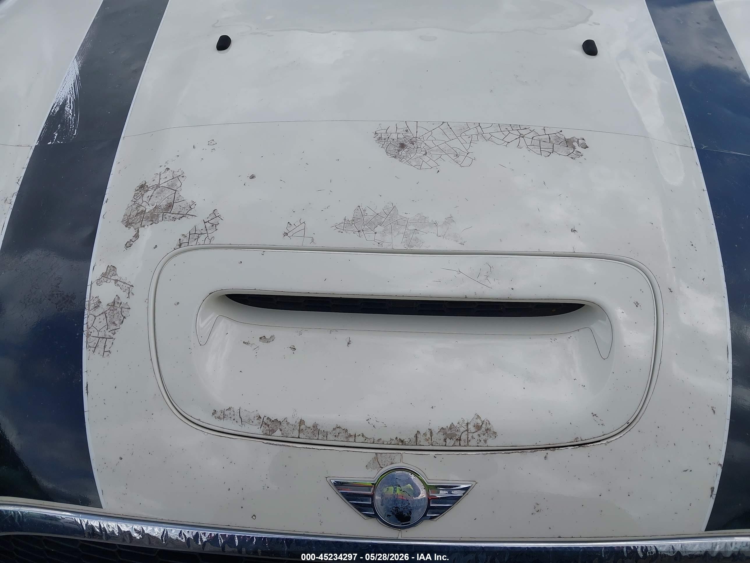 2010 Mini Cooper S   Cream vin: WMWMF7C53ATX42003