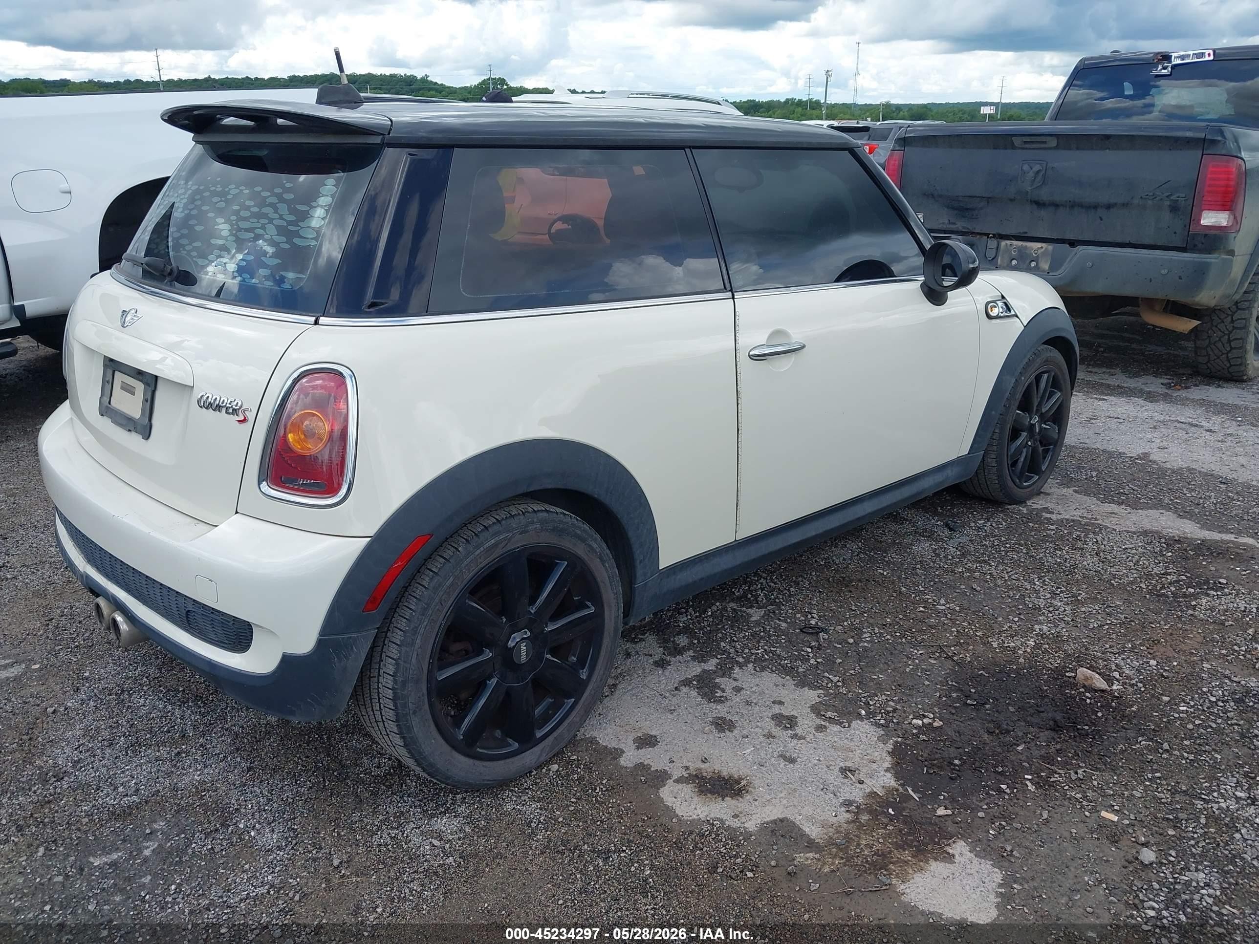 2010 Mini Cooper S   Cream vin: WMWMF7C53ATX42003