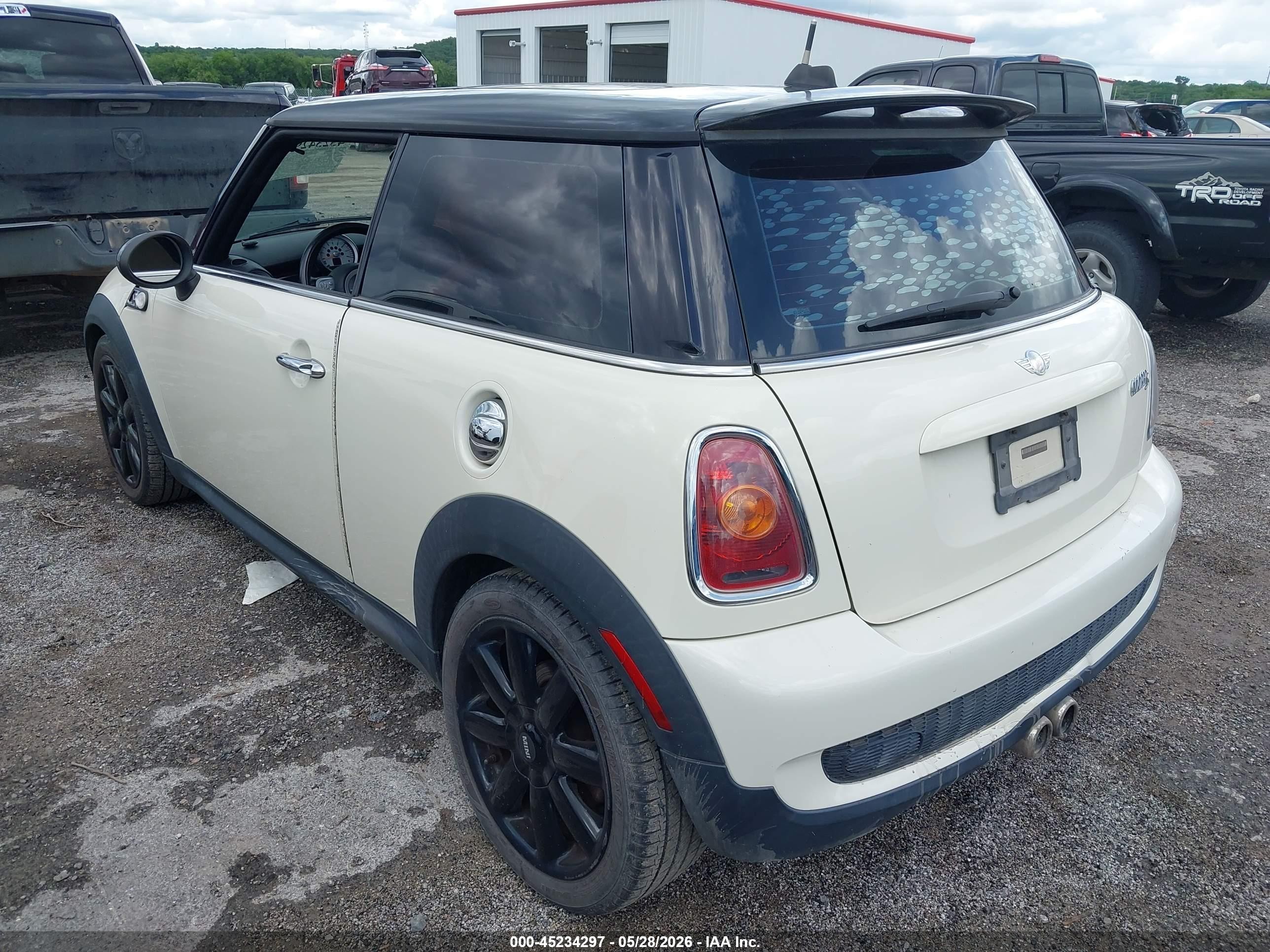 2010 Mini Cooper S   Cream vin: WMWMF7C53ATX42003