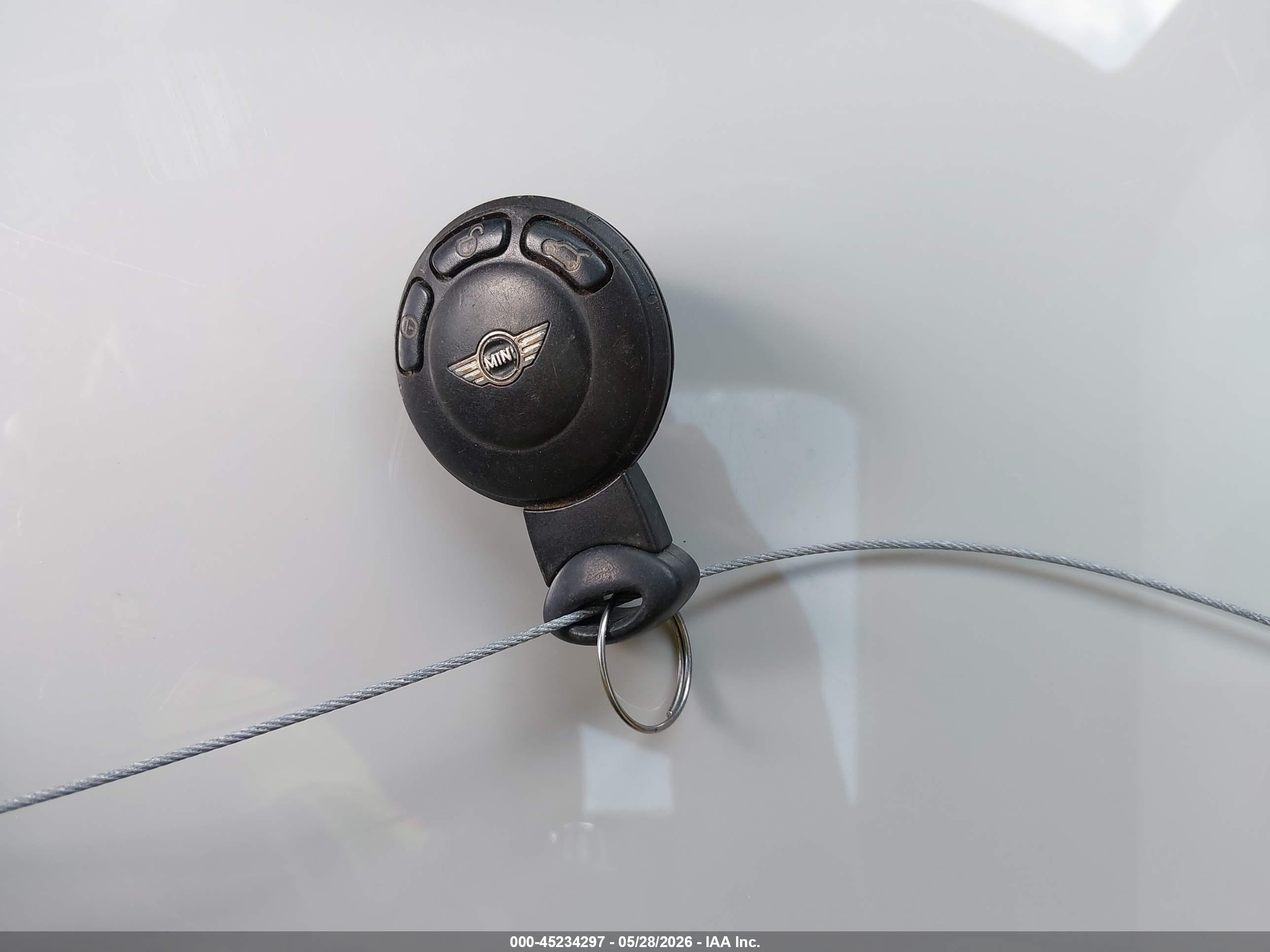 2010 Mini Cooper S   Cream vin: WMWMF7C53ATX42003