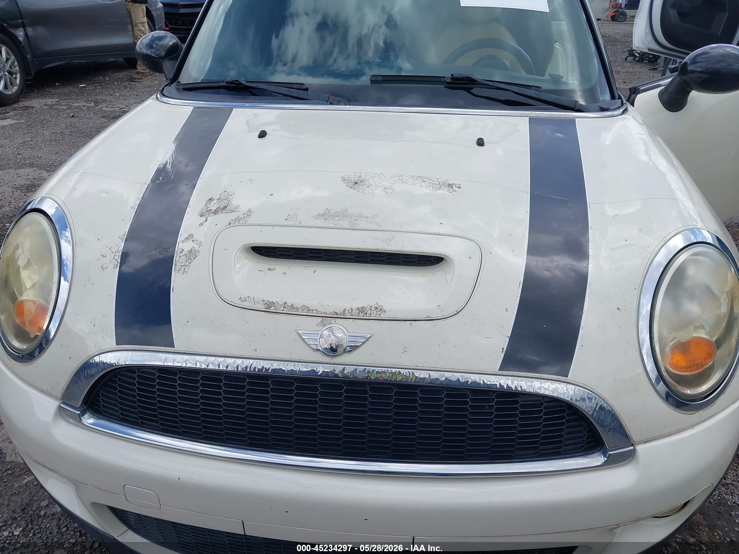 2010 Mini Cooper S   Cream vin: WMWMF7C53ATX42003