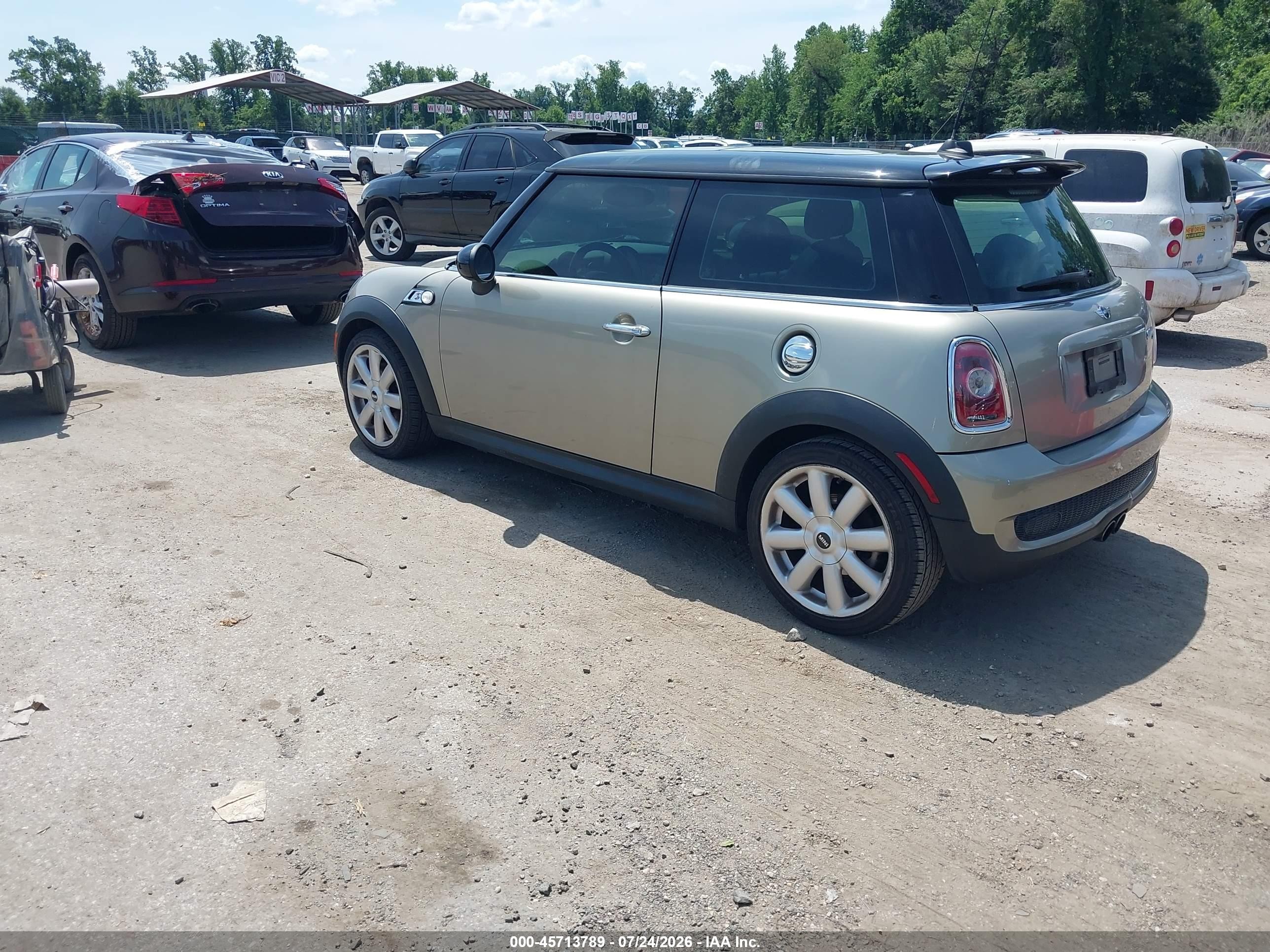 2010 Mini Cooper S   Brown vin: WMWMF7C55ATZ73274
