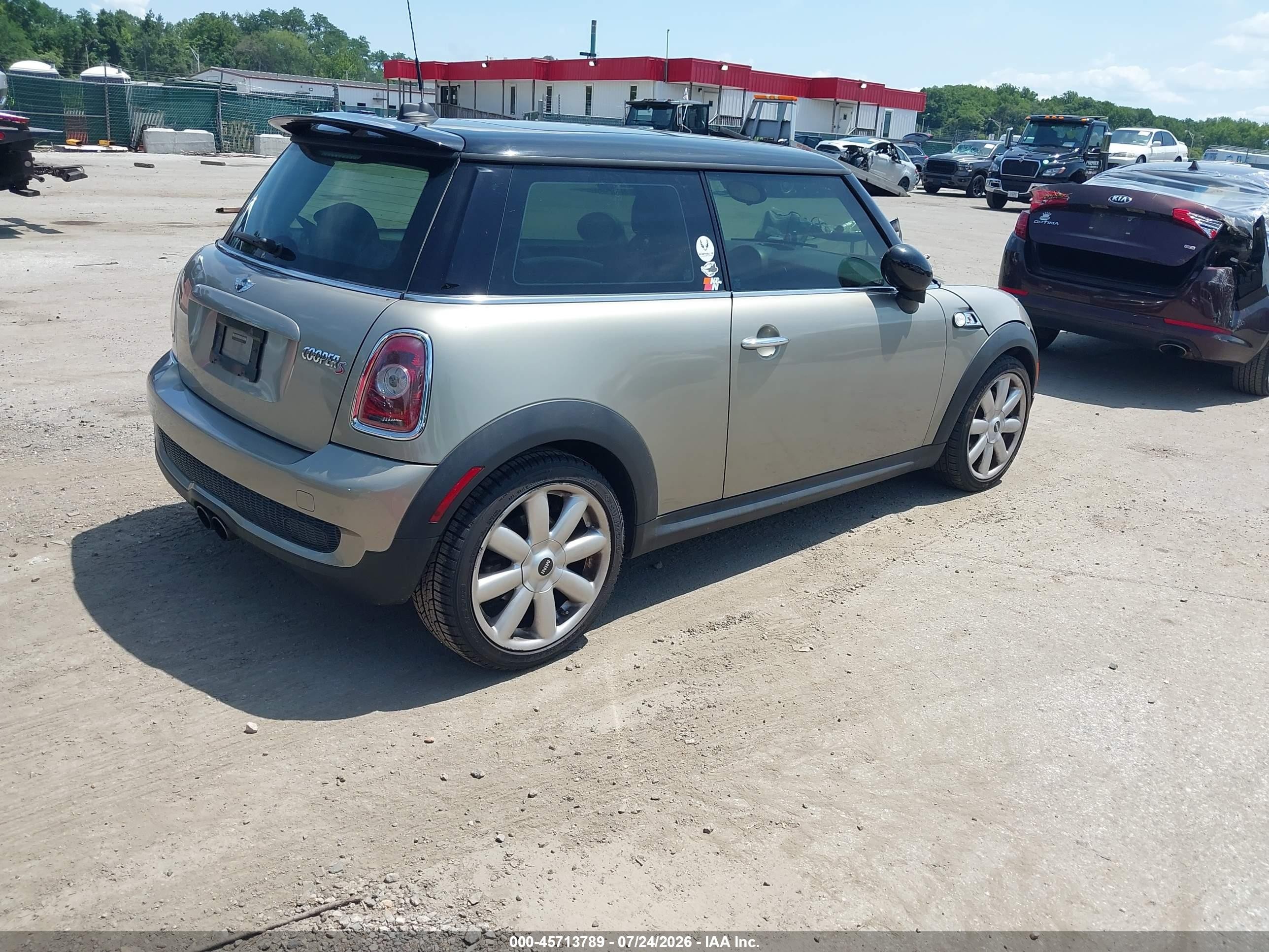 2010 Mini Cooper S   Brown vin: WMWMF7C55ATZ73274