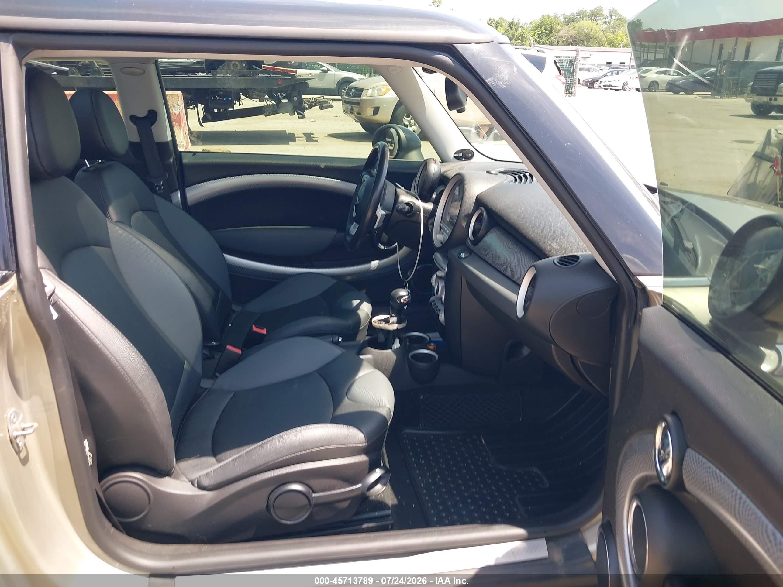 2010 Mini Cooper S   Brown vin: WMWMF7C55ATZ73274