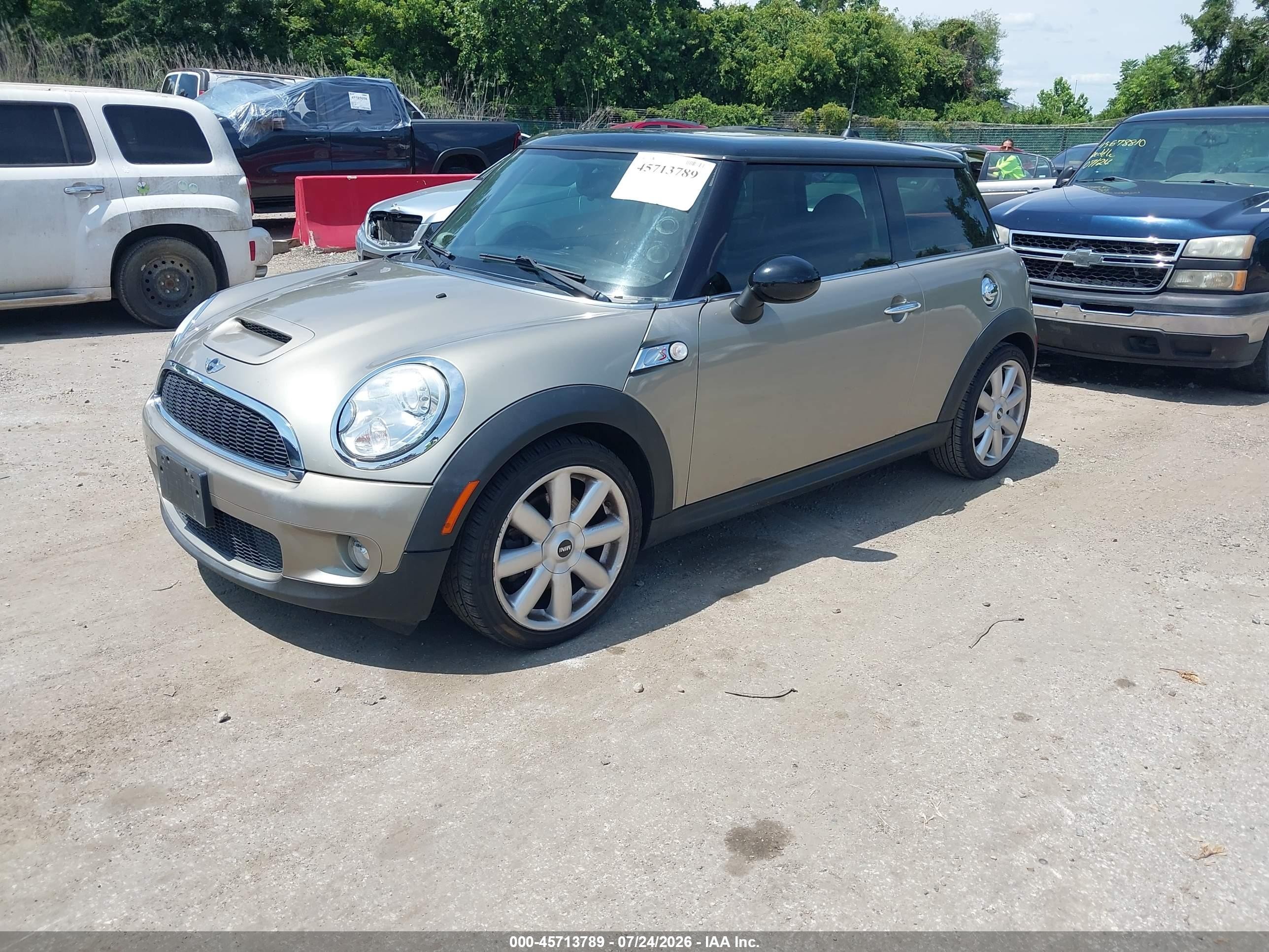 2010 Mini Cooper S   Brown vin: WMWMF7C55ATZ73274