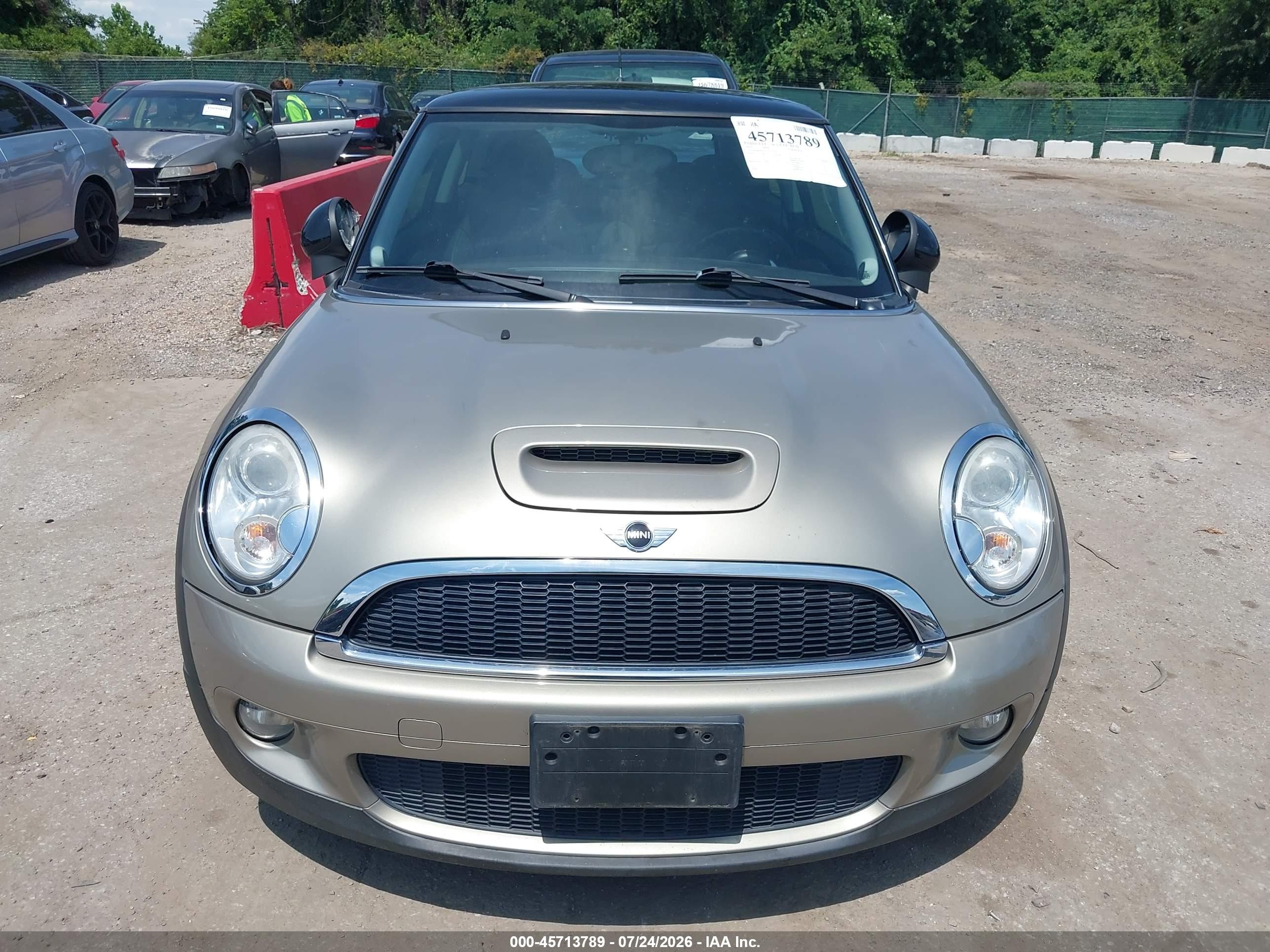 2010 Mini Cooper S   Brown vin: WMWMF7C55ATZ73274