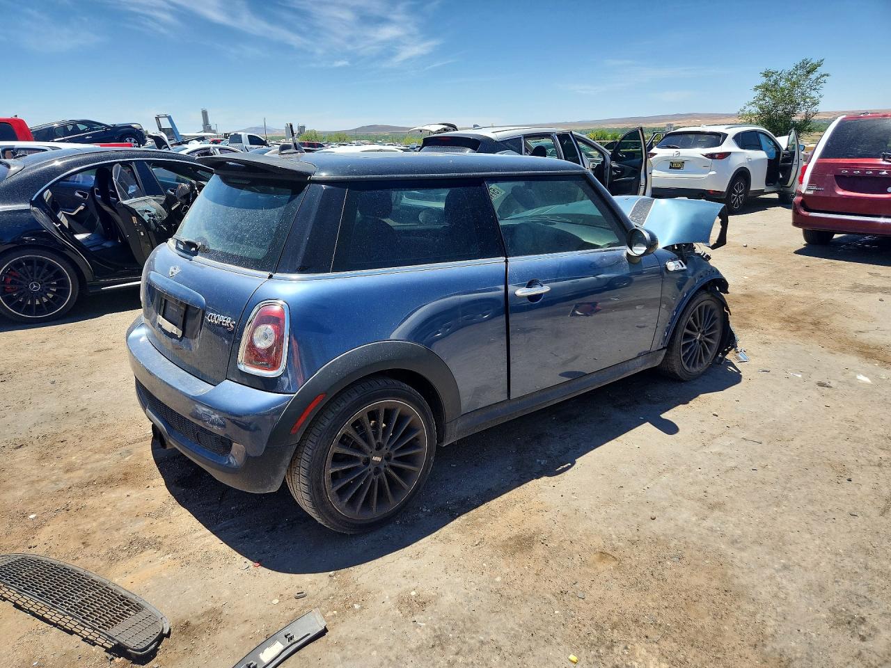 2010 Mini Cooper S Blue vin: WMWMF7C55ATZ73372