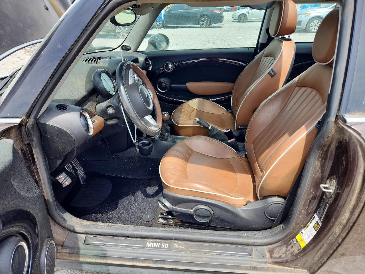 2010 Mini Cooper S Brown vin: WMWMF7C56ATX46028