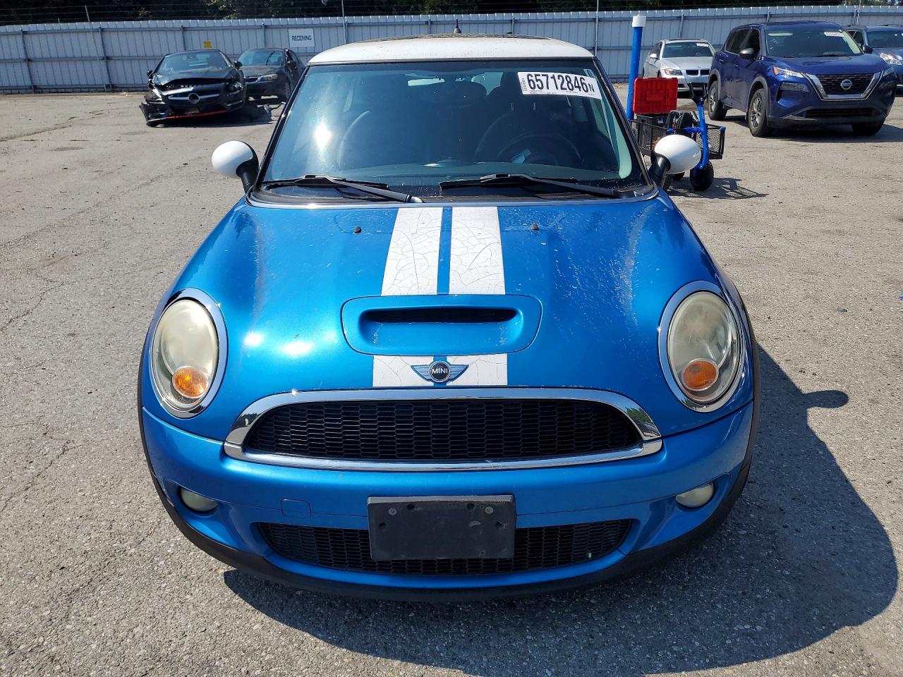 2010 Mini Cooper S Blue vin: WMWMF7C59ATW89517