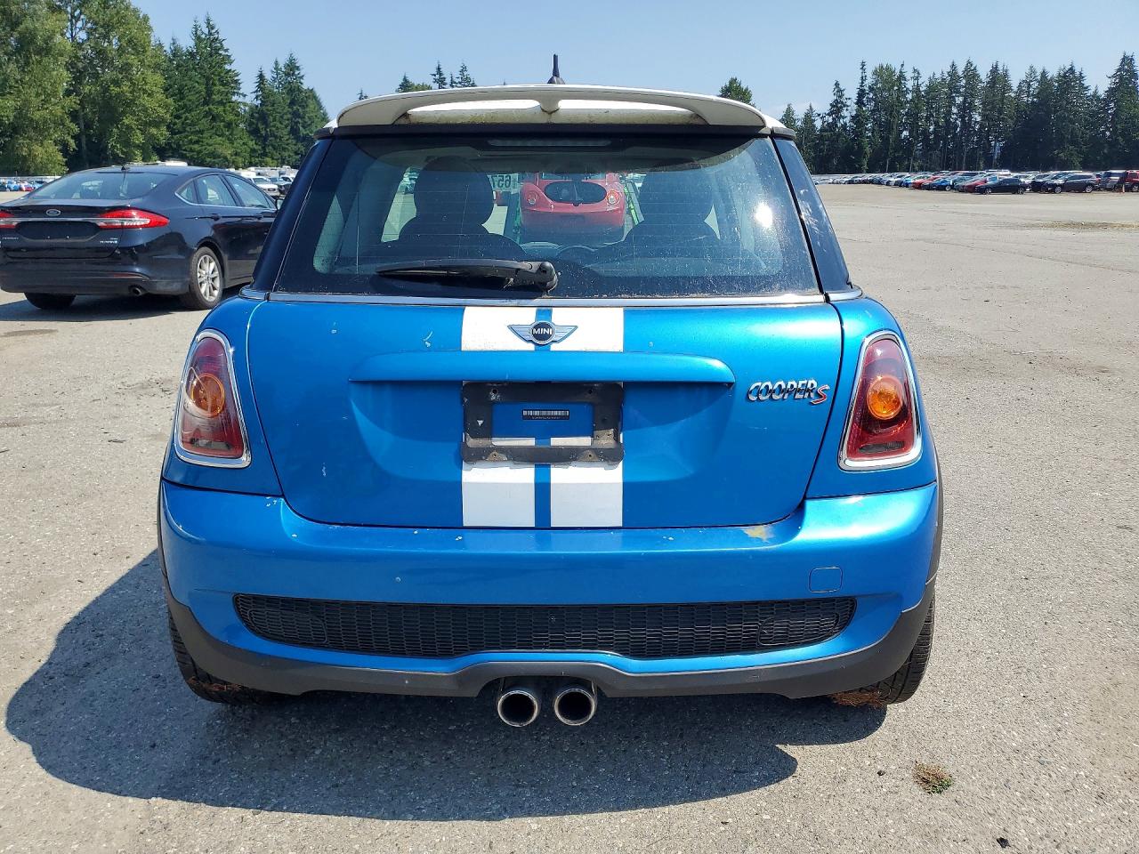 2010 Mini Cooper S Blue vin: WMWMF7C59ATW89517