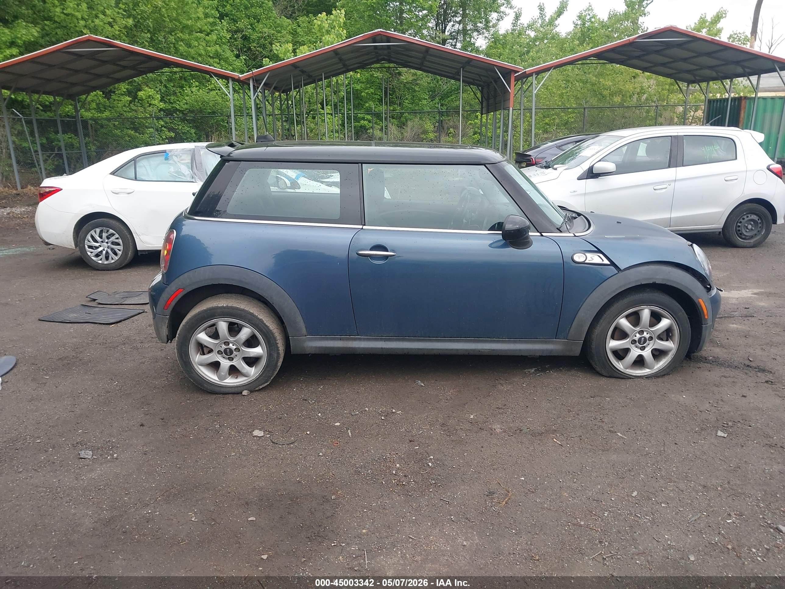 2010 Mini Cooper S   Blue vin: WMWMF7C59ATW89601